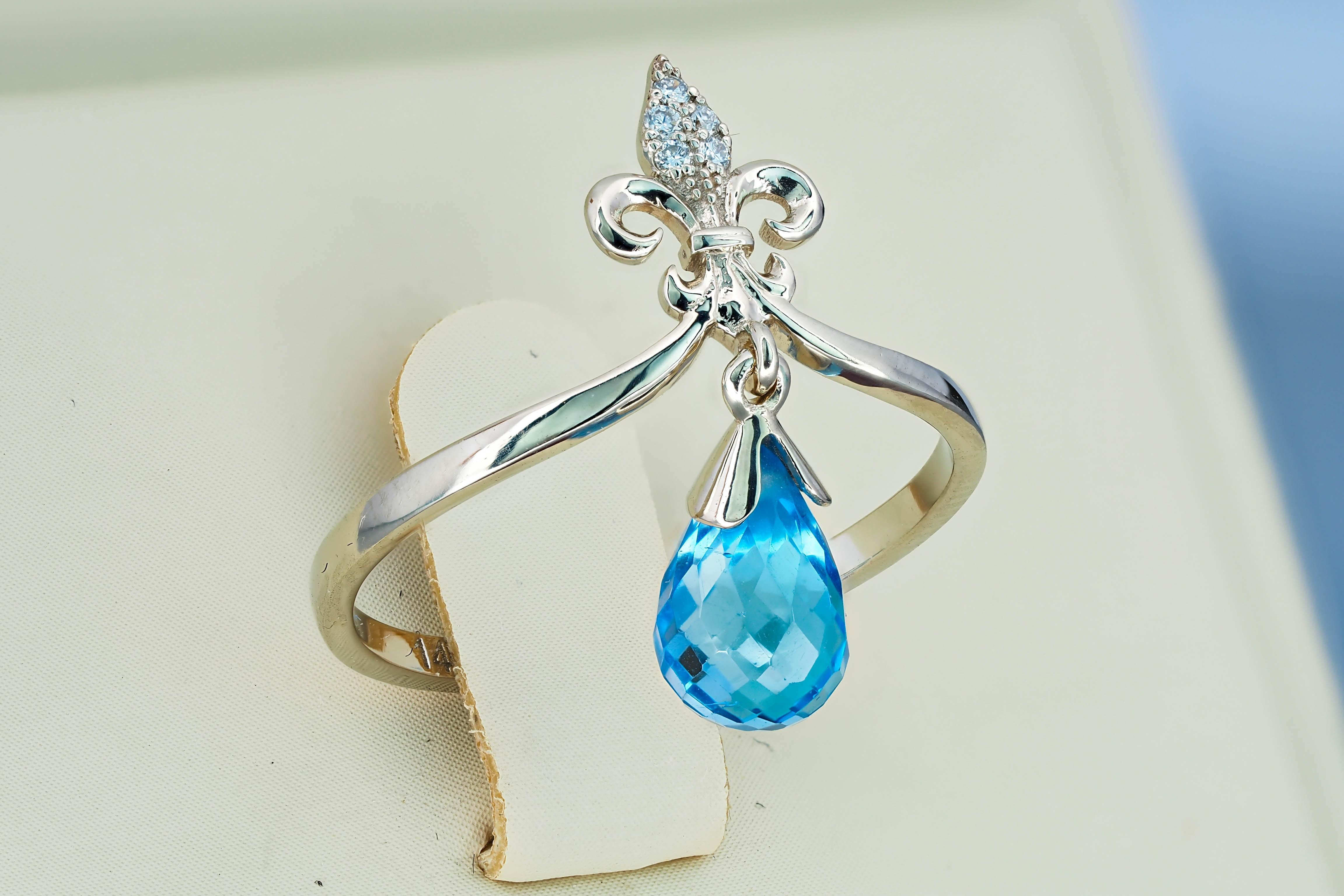 in vendita:  Anello in oro 14k con topazio taglio briolette e diamanti 2