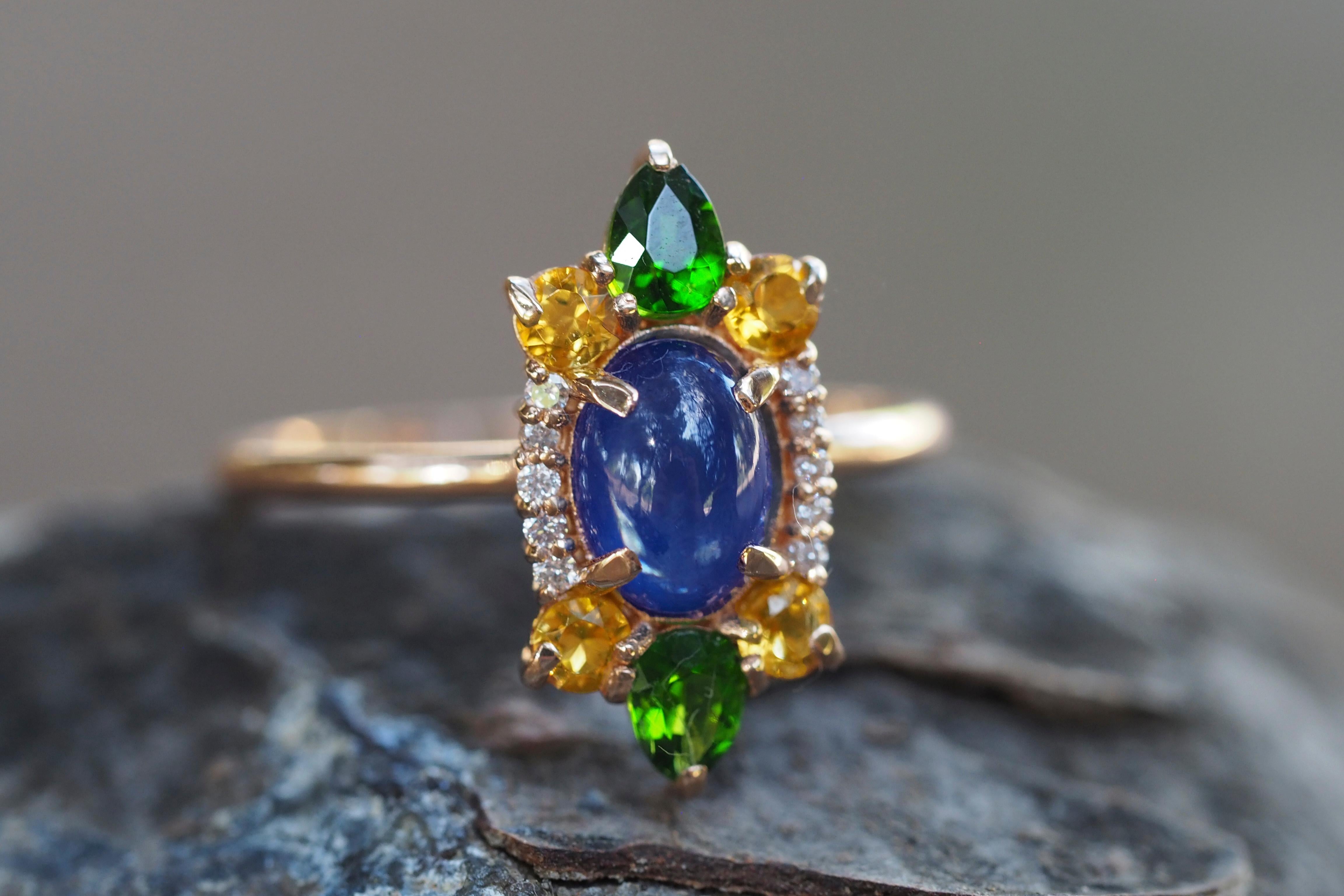 14k Gold ring with cabochon Sapphire, Chrome diopsides, Sapphires, Diamonds. 
Colorful ring. Rainbow ring. Multi Color Natural Gemstone Ring.

Metal: 14k gold
Weight: 2.5 g. depends from size.

Central gemstone: sapphire
Color - blue
Oval cabochon