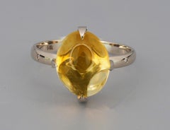 Citrine Cabochon and Diamonds 14k gold ring.