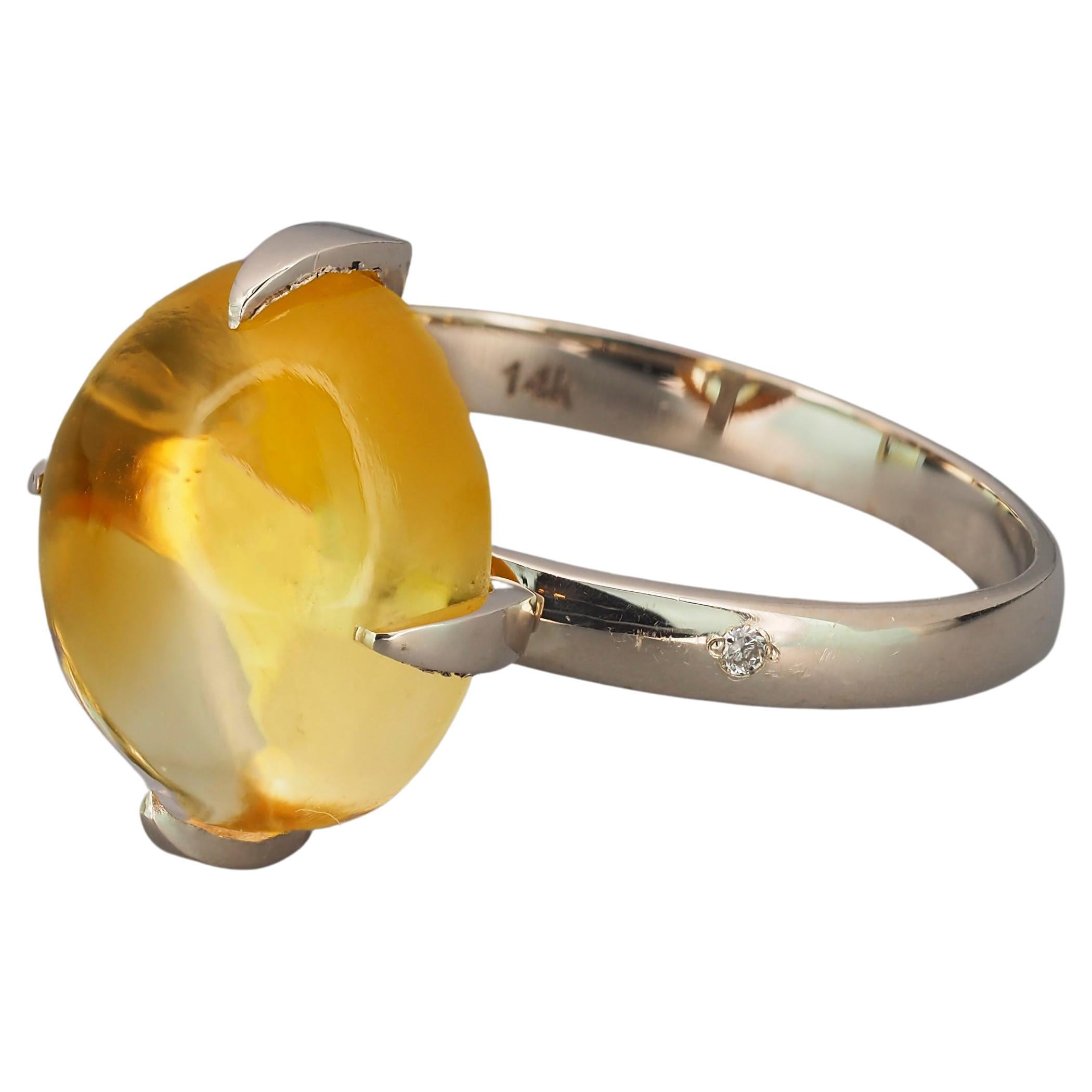 Citrine Cabochon and Diamonds 14k gold ring.