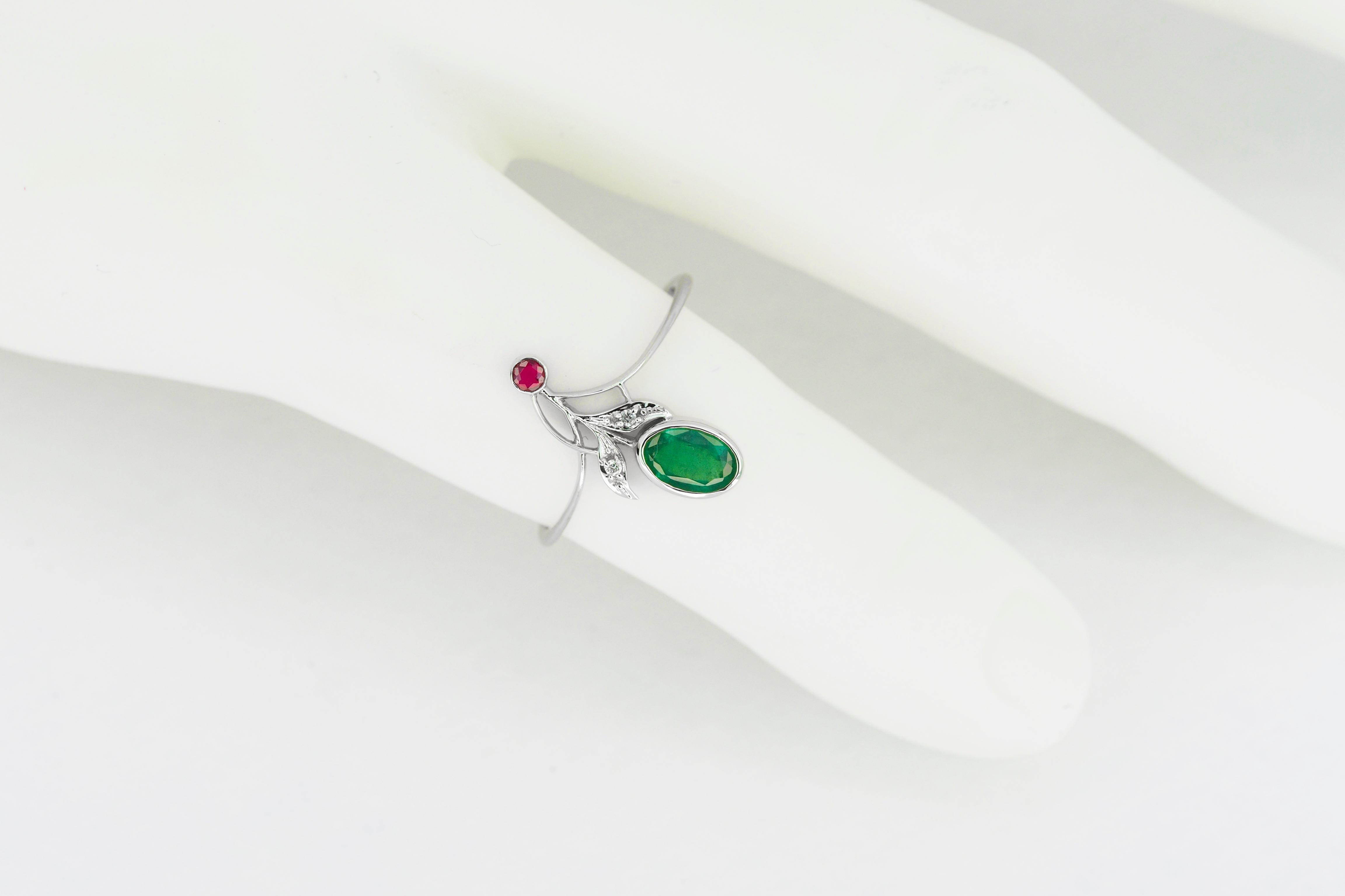 14k gold ring with emerald, ruby and diamonds

14 k gold
total weight 1.6 gr

Gemstones (all are tested by proffesional gemmologist)
Emerald: oval cut, 0.8 ct, transparent,  green color. 

Ruby: round cut, transparent, red color., 0.07 ct
