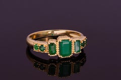 Vintage style 14k gold ring with emeralds