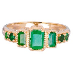 14 Karat Gold Ring mit Smaragden