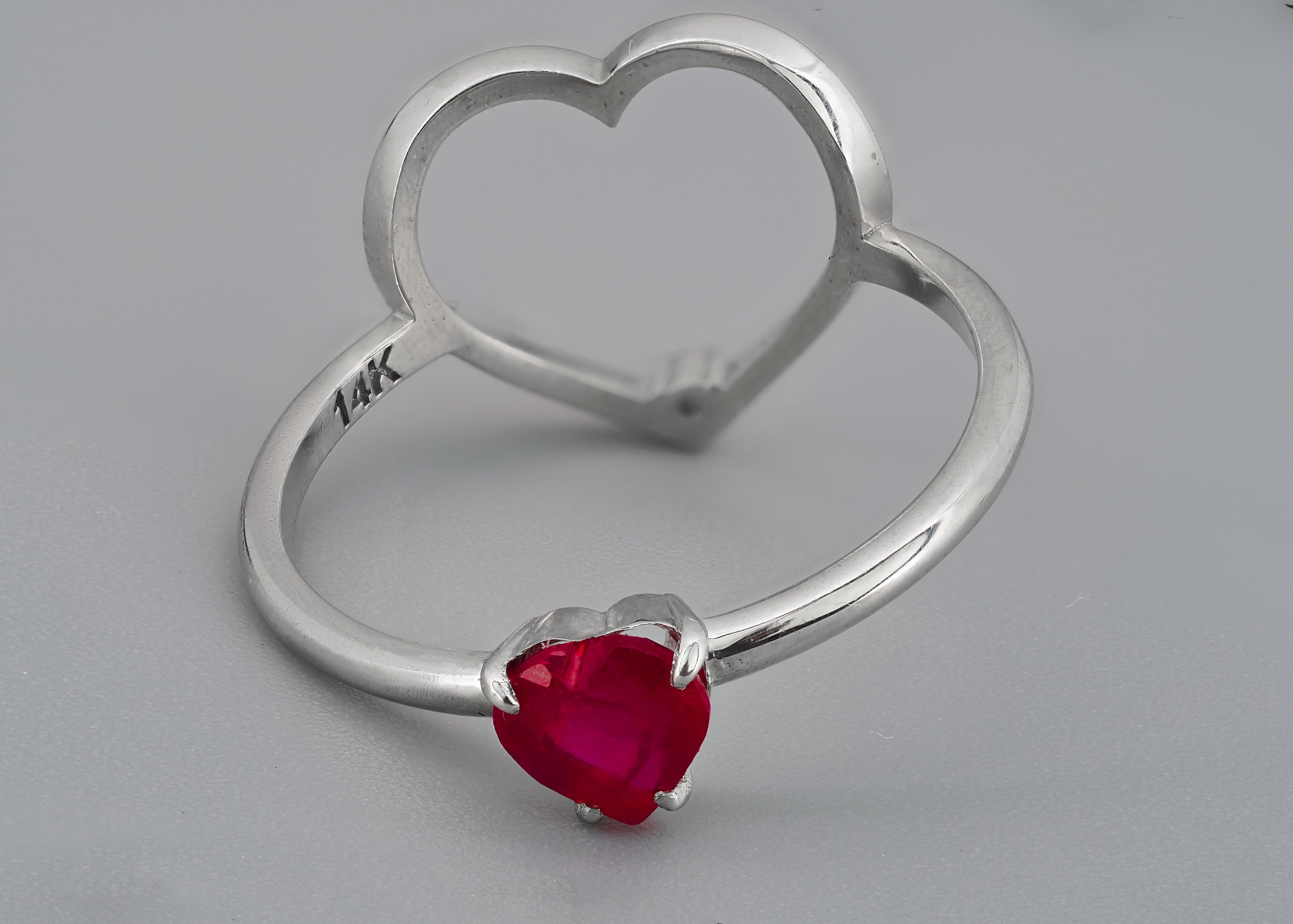 14 kt solid gold ring with heart shape natural ruby and diamonds. July birthstone. Two sides wearable love ring with heart shape ruby and gold heart on other side!
Weight: 1.9 g. aprox depends from choosen size

Central stone: Natural ruby
Weight -