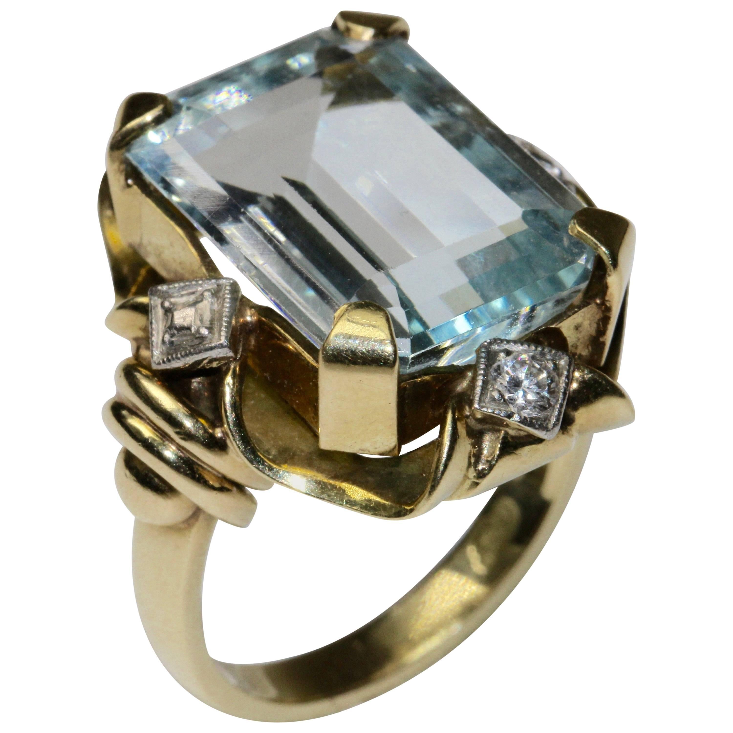 14K gold ring with large aquamarine and two brilliants