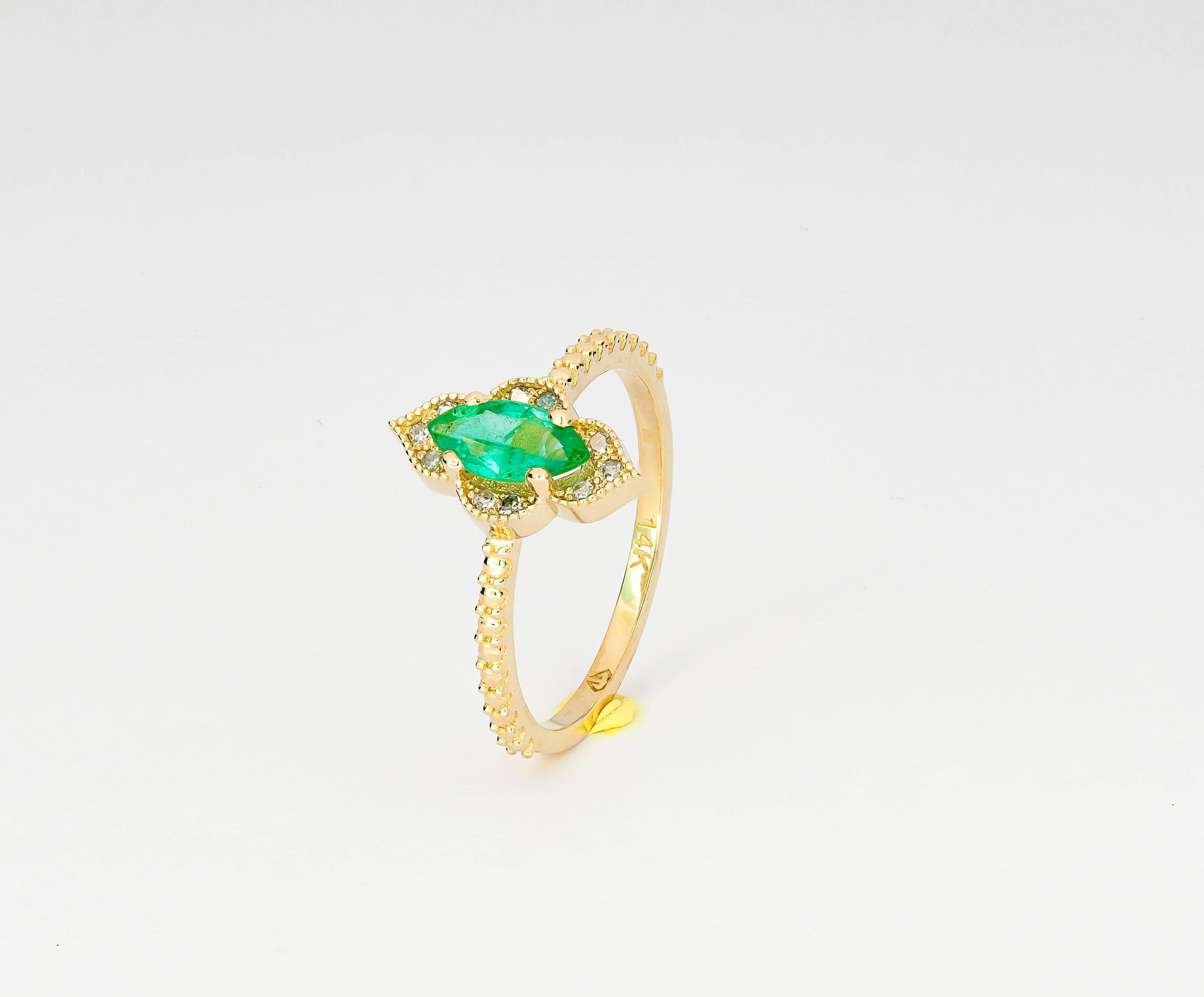 Im Angebot: 14 Karat Gold Ring mit Smaragd im Marquise-Schliff und Diamanten () 3