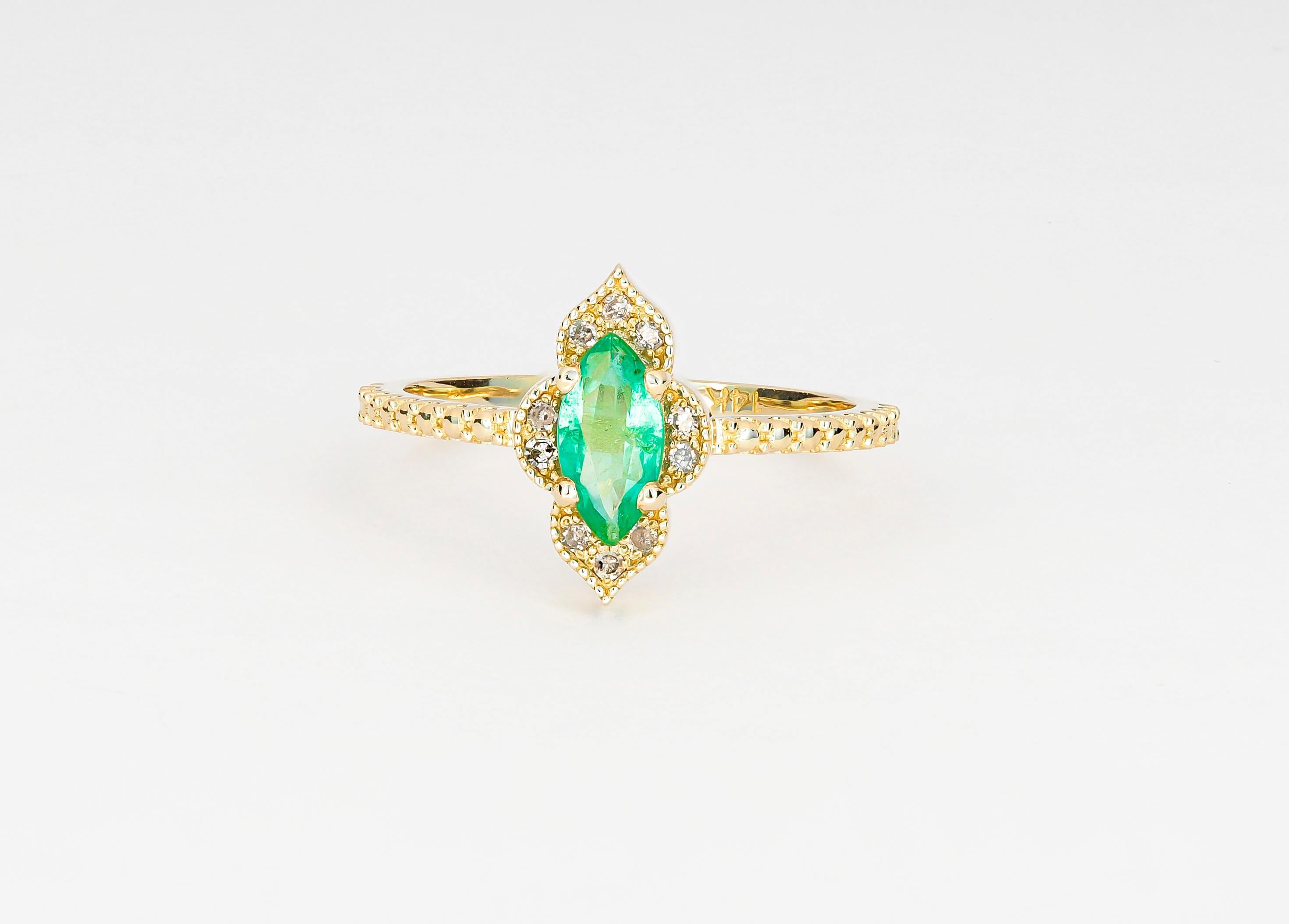 Im Angebot: 14 Karat Gold Ring mit Smaragd im Marquise-Schliff und Diamanten () 4