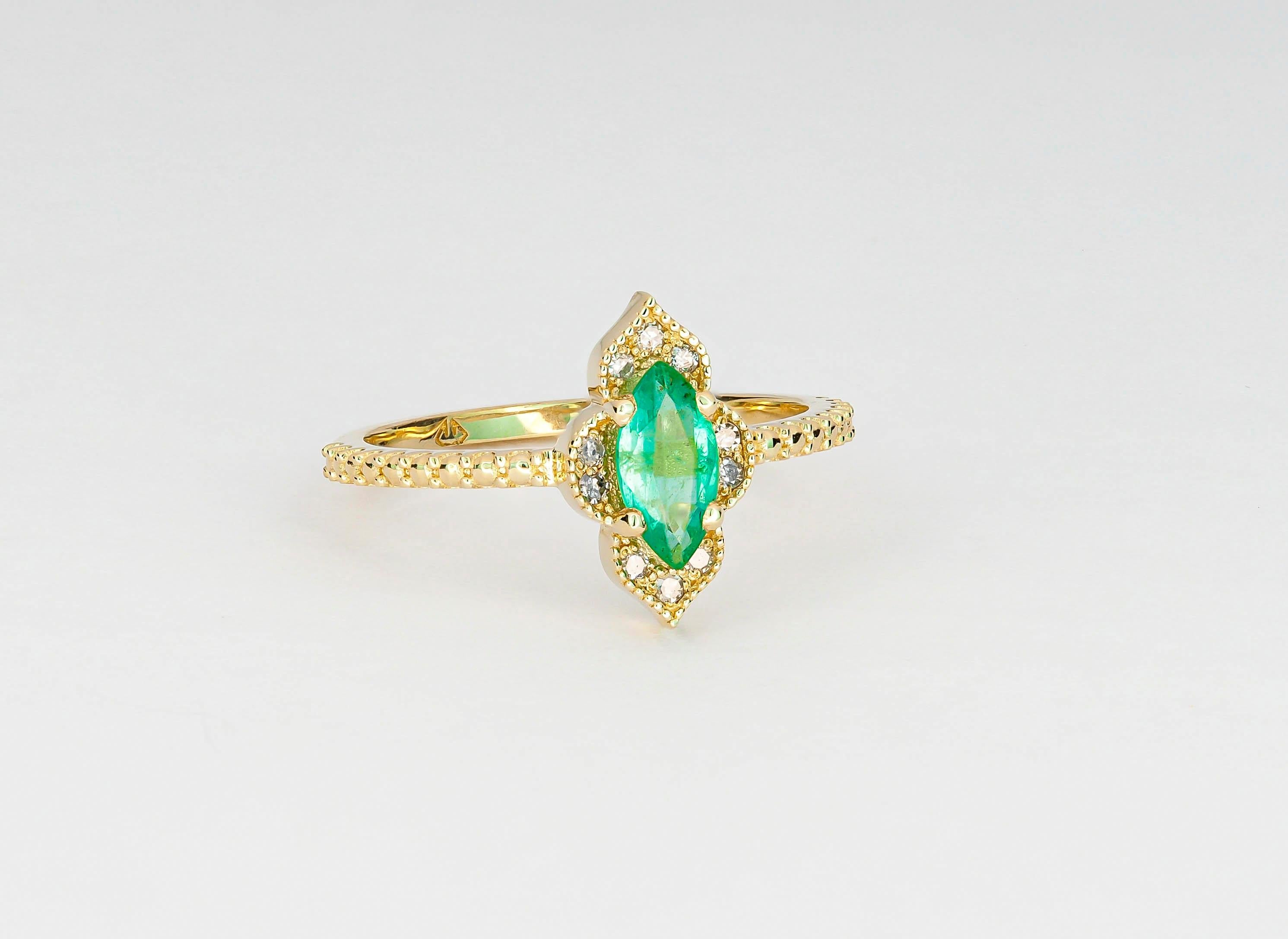 Im Angebot: 14 Karat Gold Ring mit Smaragd im Marquise-Schliff und Diamanten () 5