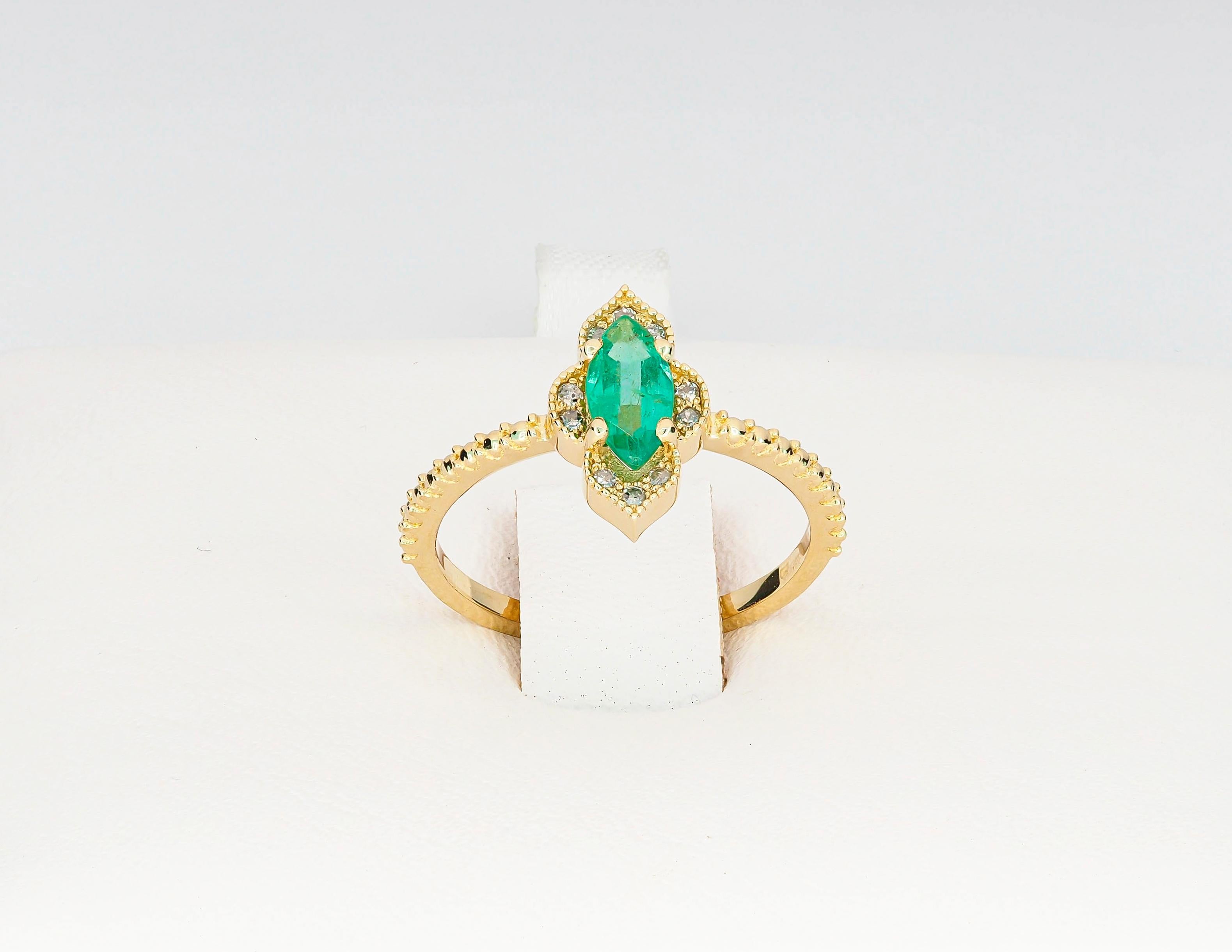 For Sale:  14k Gold Ring with Marquise Cut Emerald and Diamonds 8