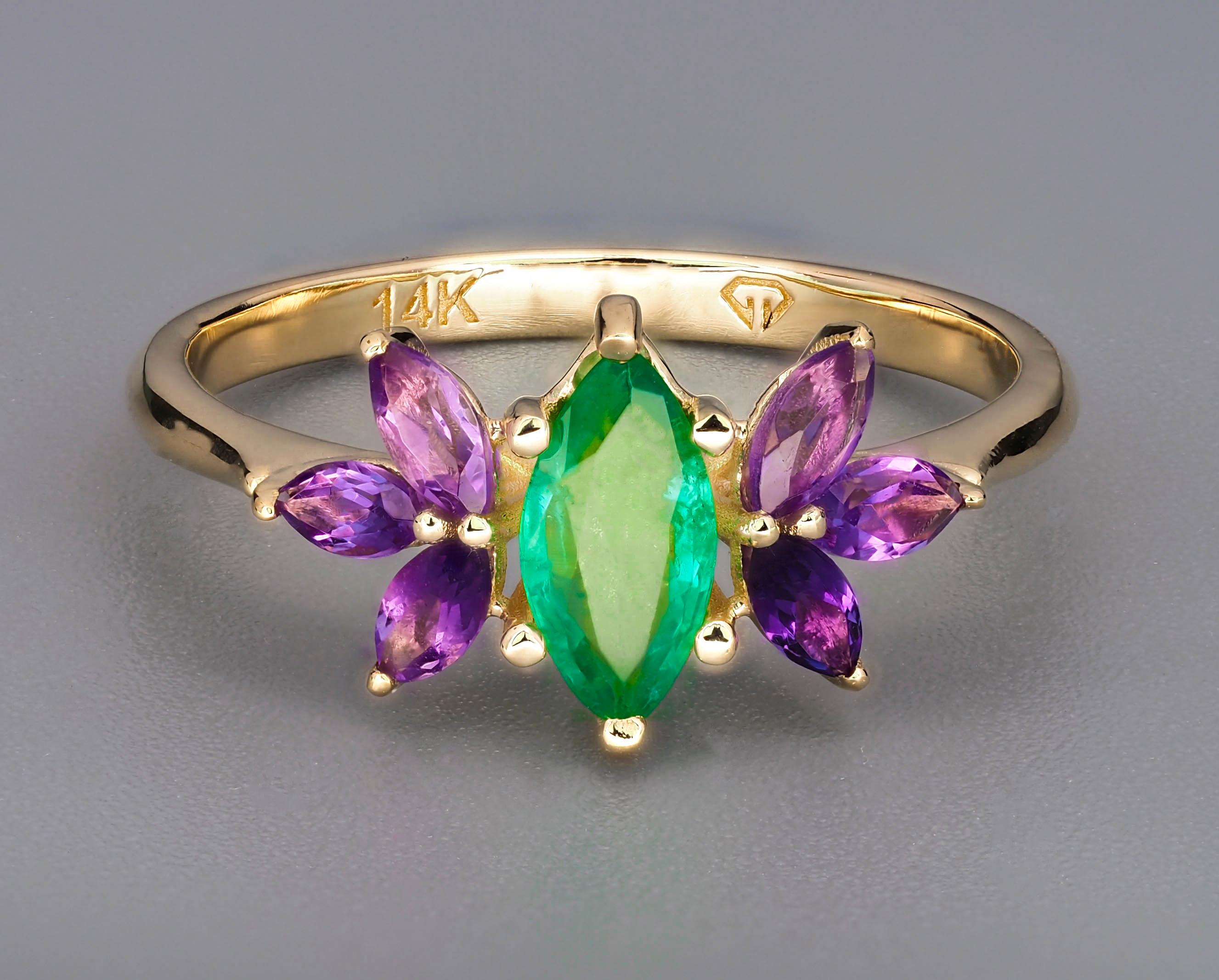 For Sale:  Emerald gold ring. 14k Gold Ring with Marquise Emerald and Amethysts.  3