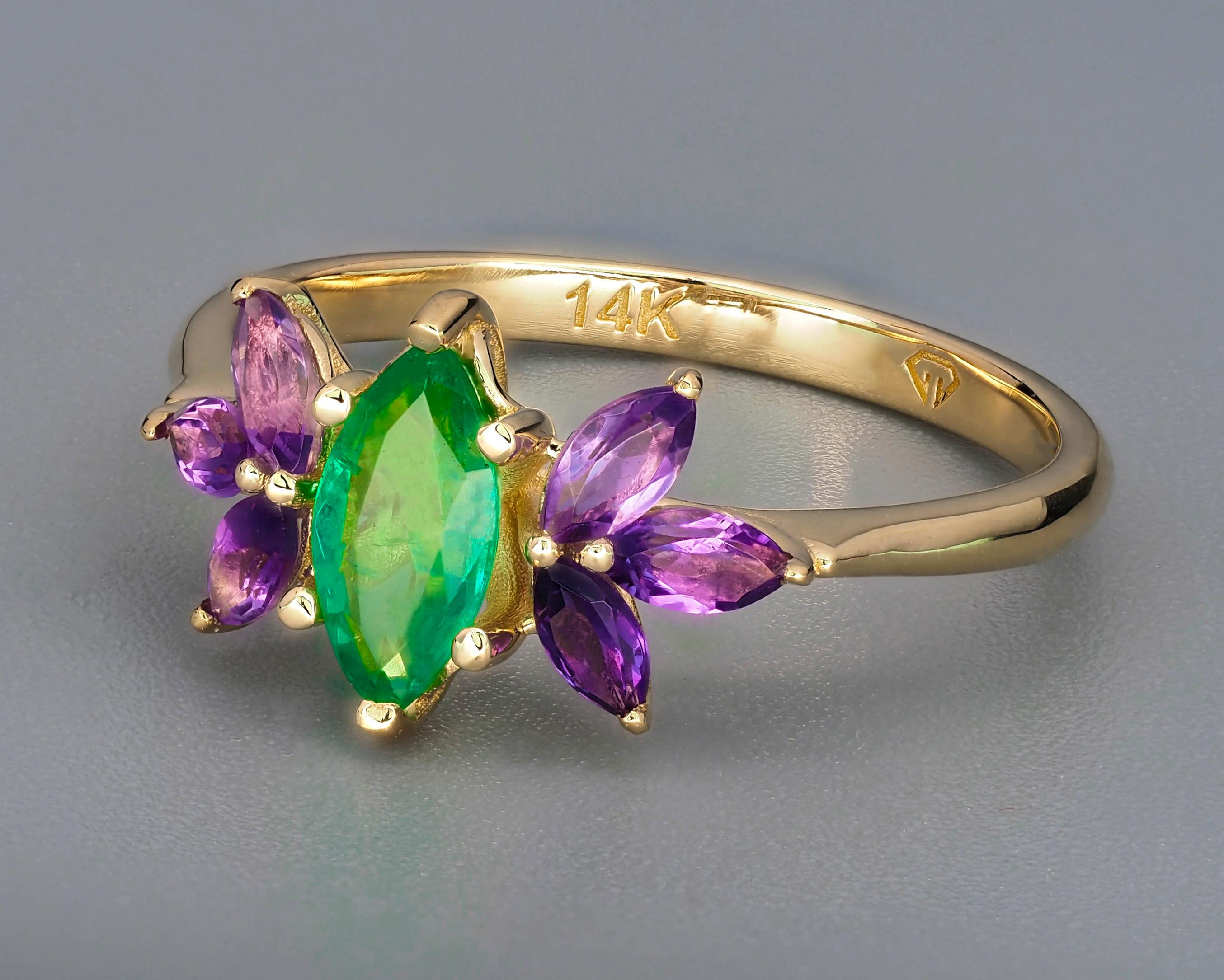 For Sale:  Emerald gold ring. 14k Gold Ring with Marquise Emerald and Amethysts.  5