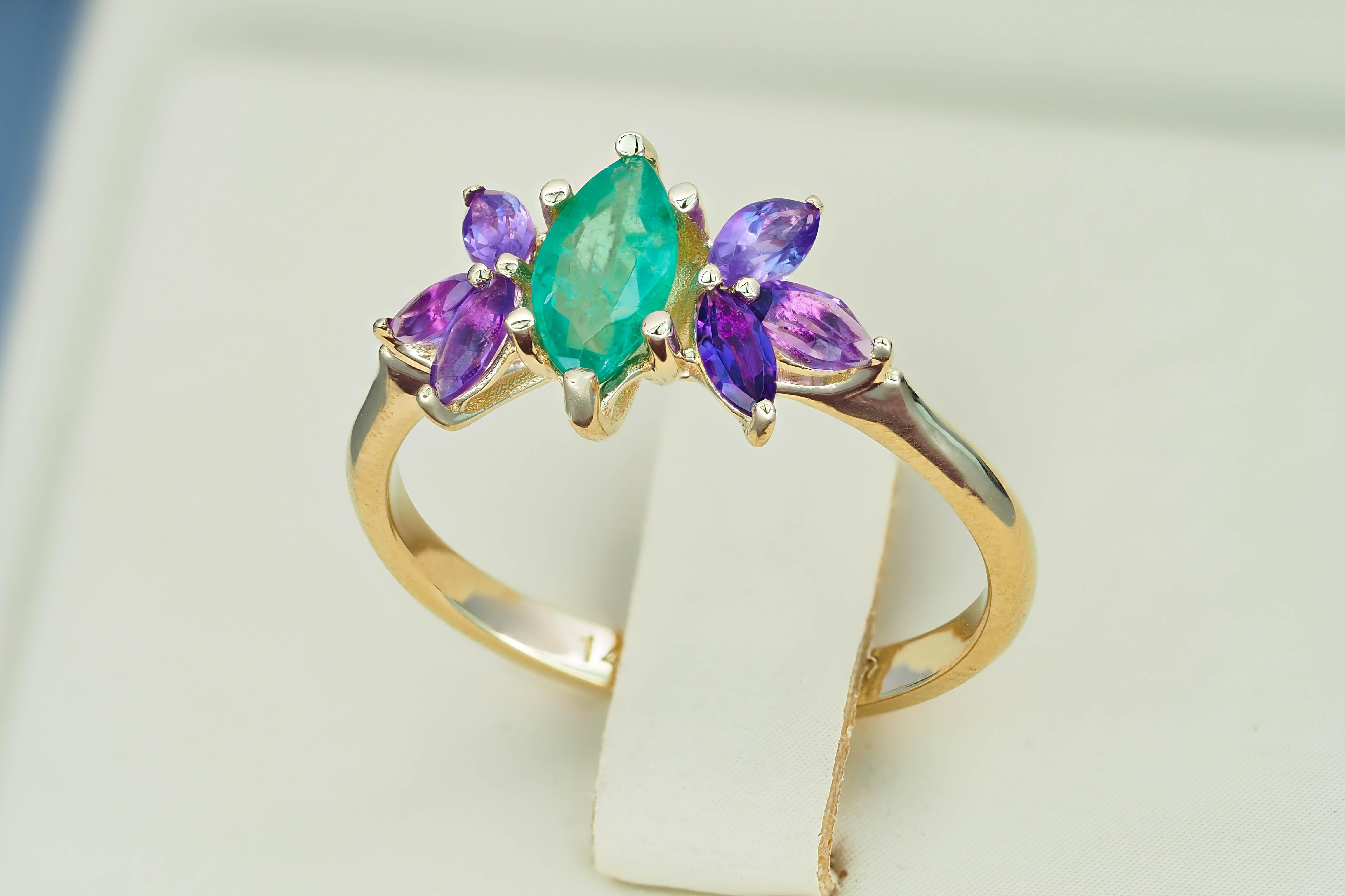 For Sale:  Emerald gold ring. 14k Gold Ring with Marquise Emerald and Amethysts.  9