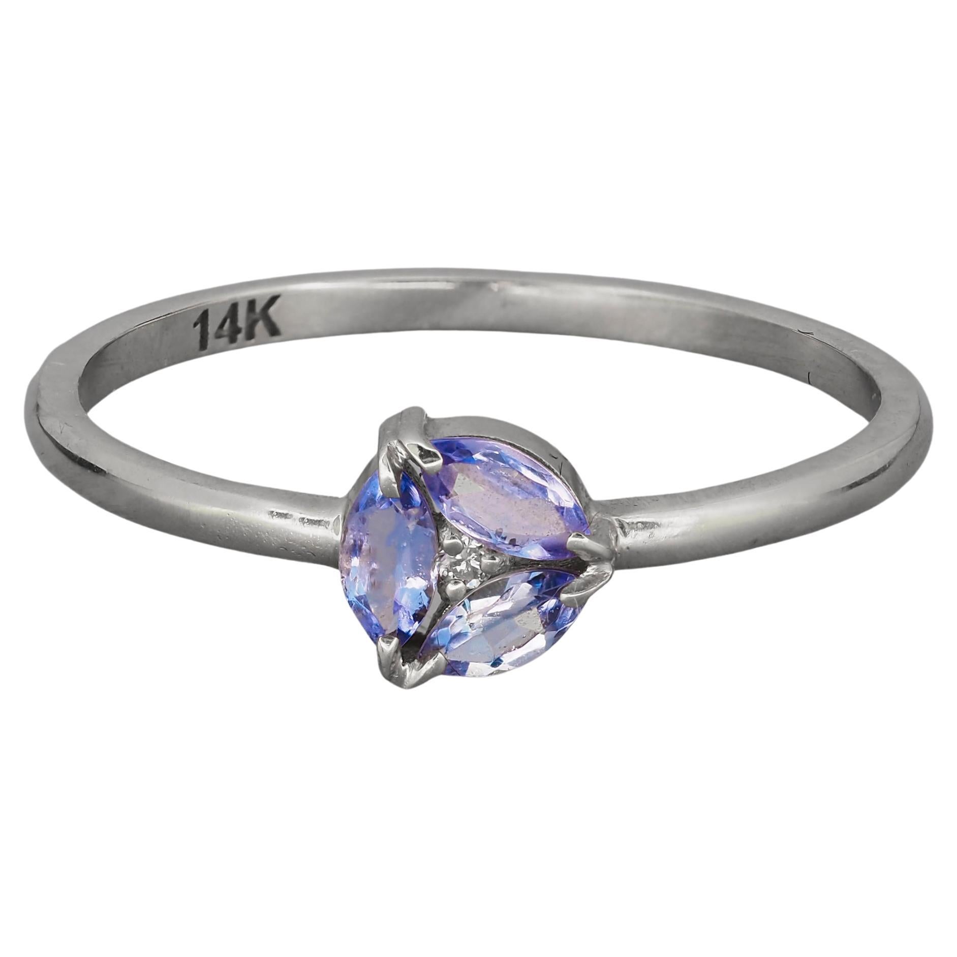 For Sale:  14k Gold Ring with Marquise Tanzanite and Diamonds