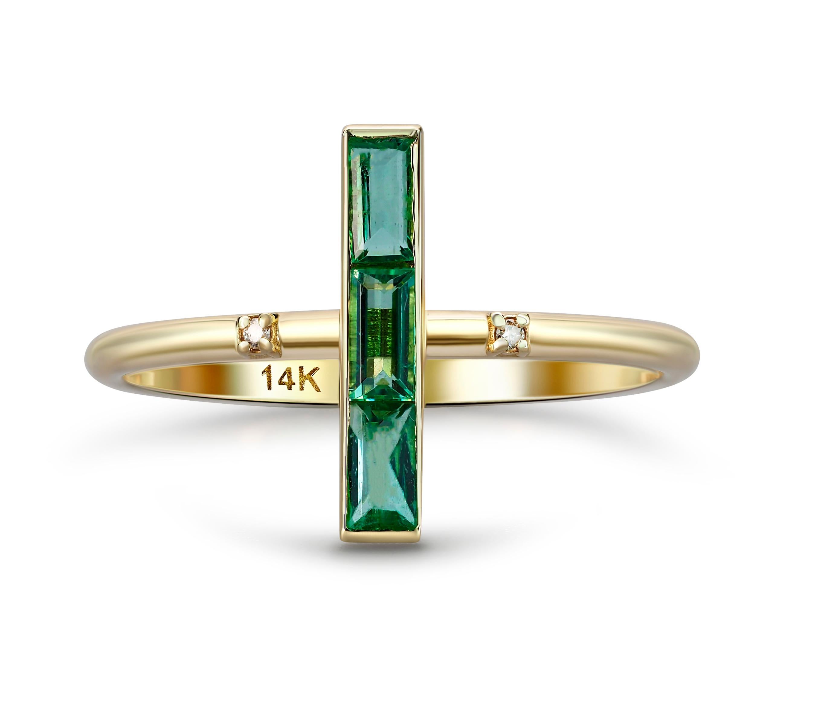 14k gold ring with natural Emeralds. 
Baguette emerald ring. Minimalist emerald ring. Unisex ring. May Birthstone Ring. Emerald gold ring.

Metal: 14k gold
Weight: 1.55 g. depends from size.

Central stone: Emeralds - 3 pieces
Cut: Baguette
Weight: