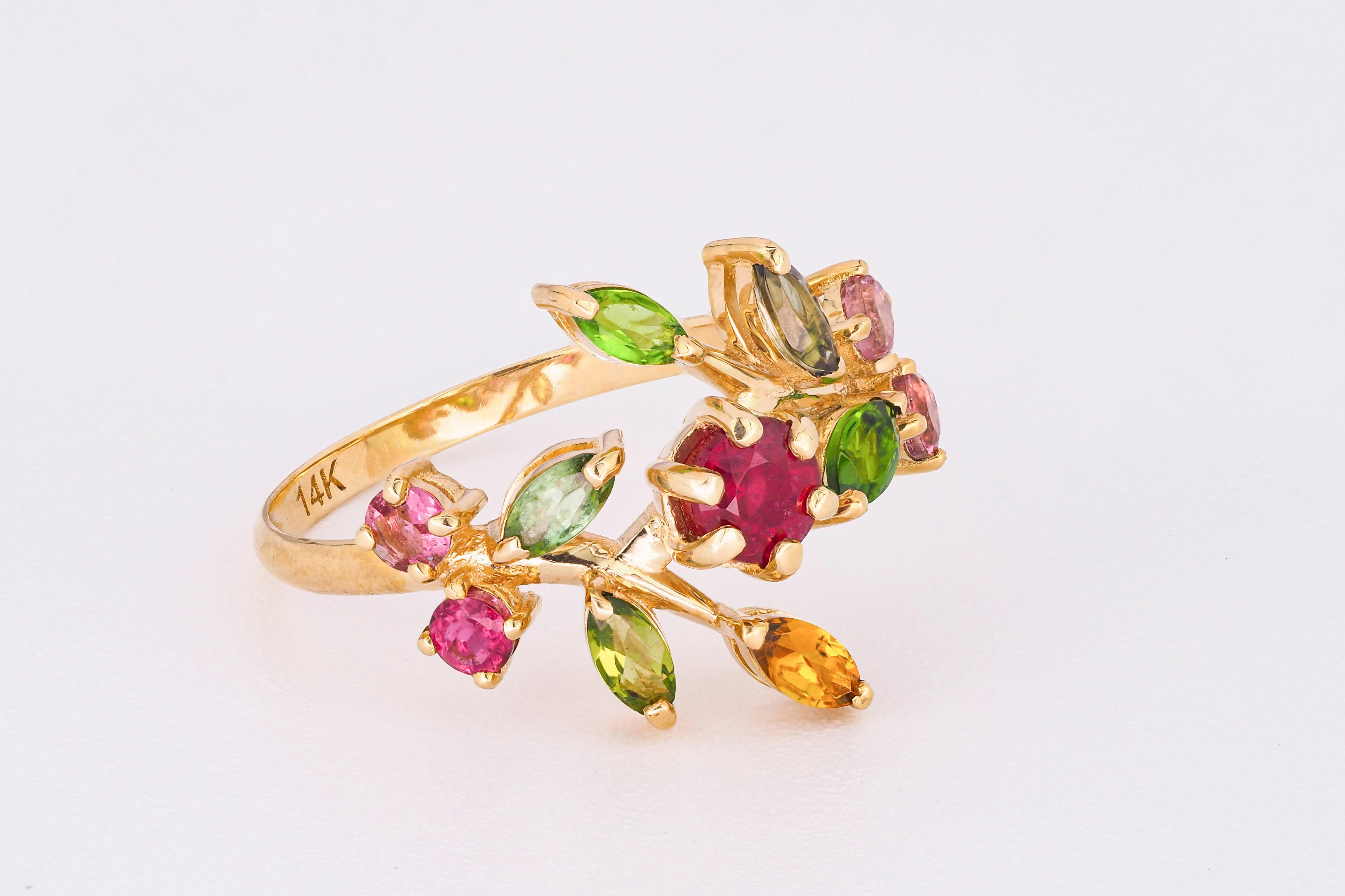 14 k gold ring with ruby, tourmalines, sapphires  - Multicolored Gemstone Rings
Metal type: Gold
Metal stamp: 14k Gold
Weight: approx. 2.24 g

Gemstones: 
Central stone: Ruby
Cut: round
Weight: approx 0.45 ct. total.
Color: Red
Clarity: Transparent