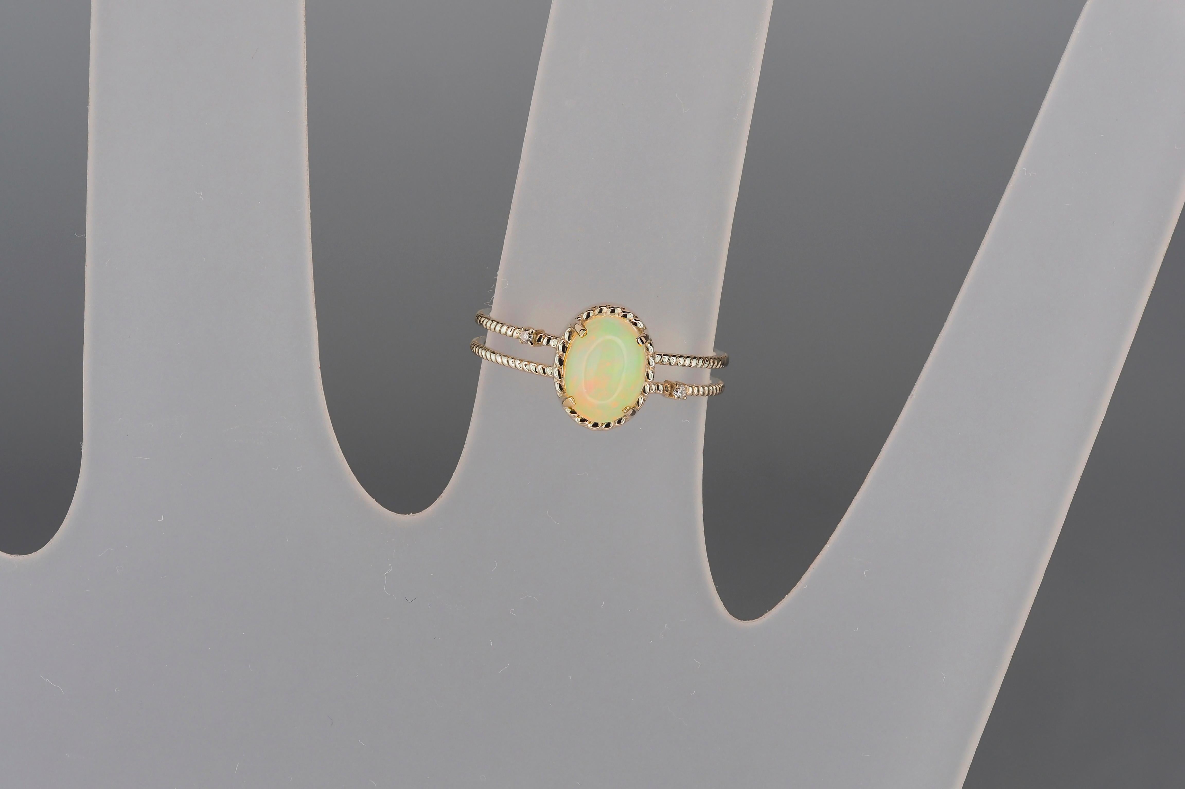 For Sale:  14k Gold Ring with Opal and Diamonds 9