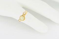 14k gold ring with opal cabochon and pearl