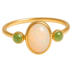 14k gold ring with opal cabochon and peridots