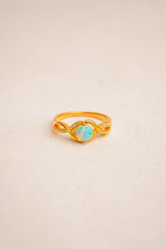 14k gold ring with opal cabochon