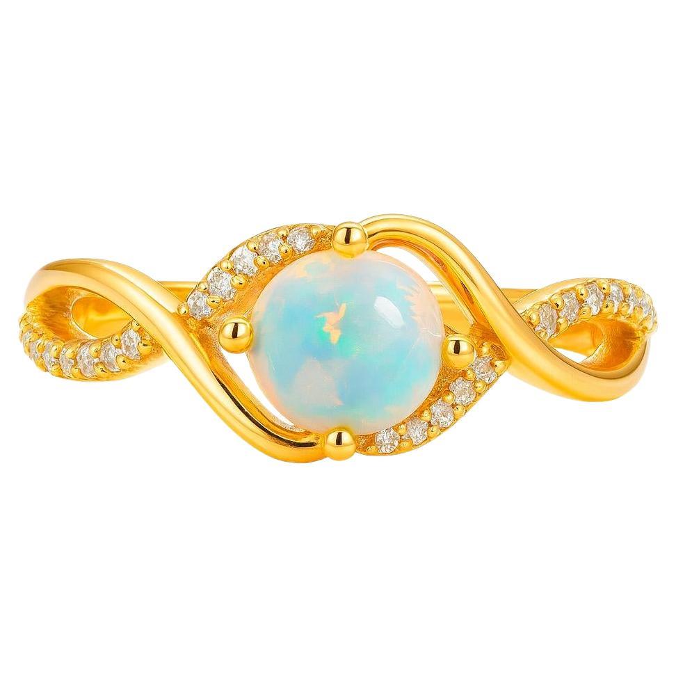 Anello in oro 14k con cabochon di opale