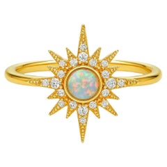 14k gold ring with opal cabochon. Starburst Opal Ring