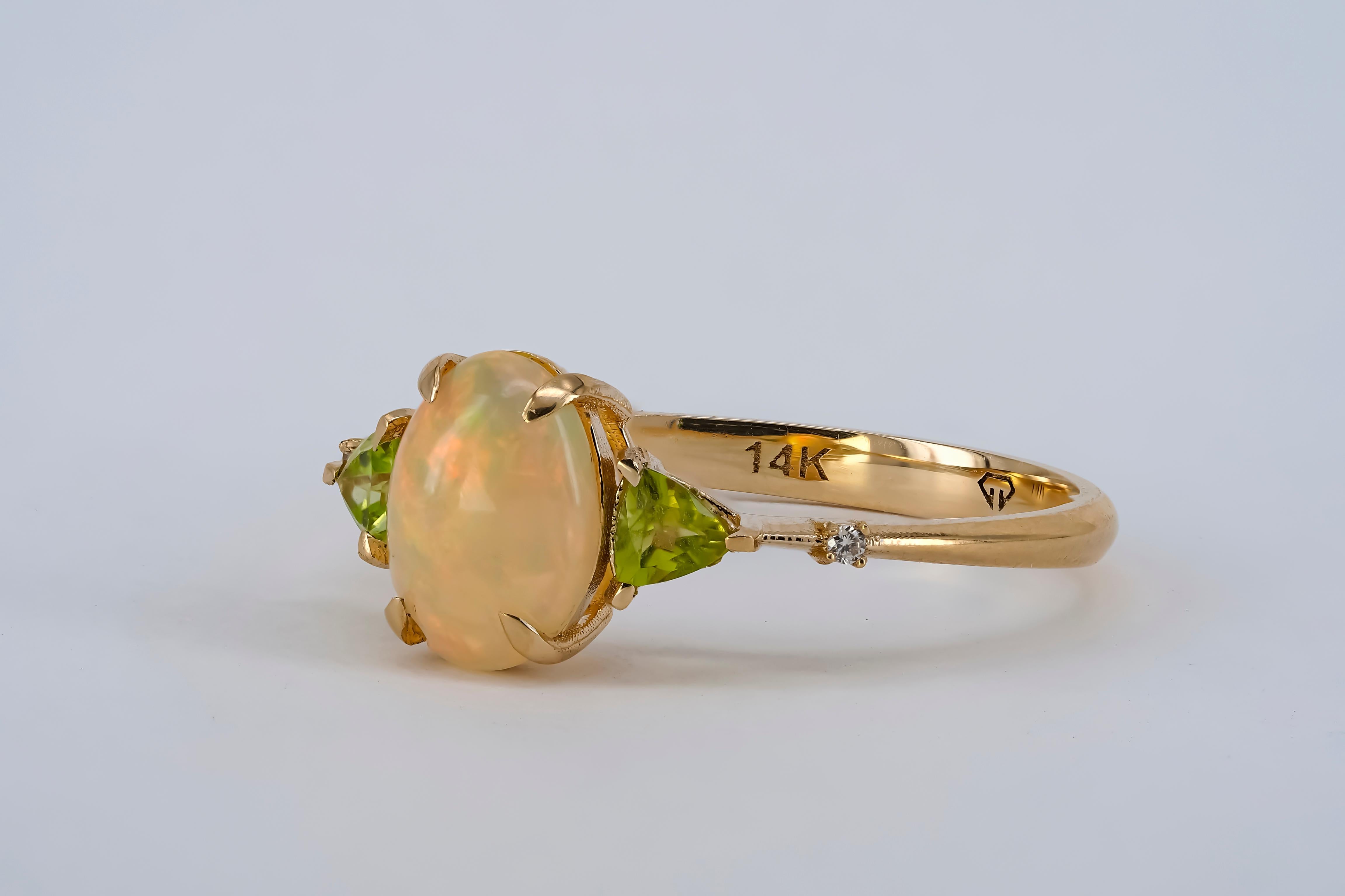 For Sale:  14k Gold Ring with Opal, Diamonds and Peridots 10