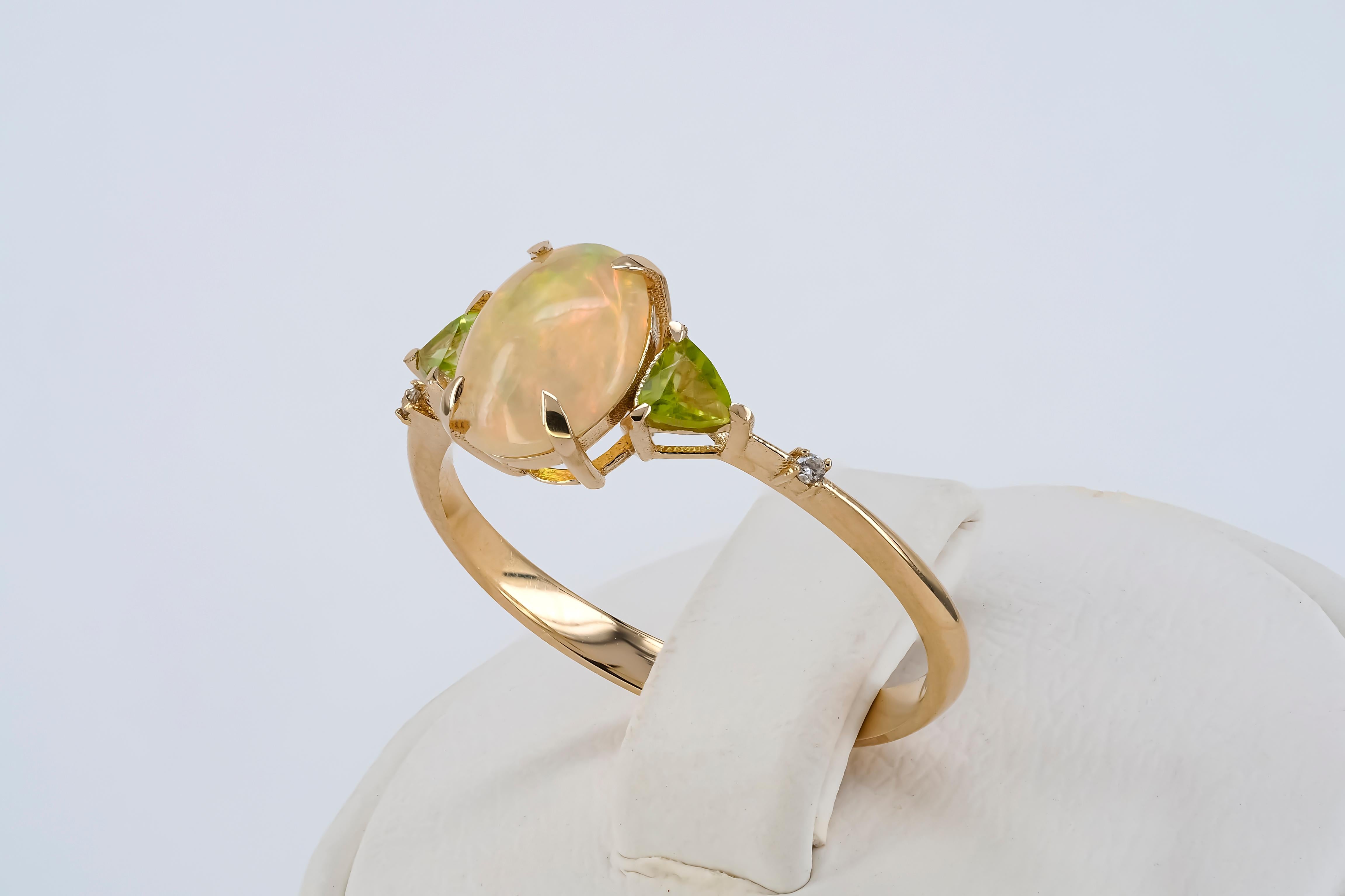 For Sale:  14k Gold Ring with Opal, Diamonds and Peridots 9