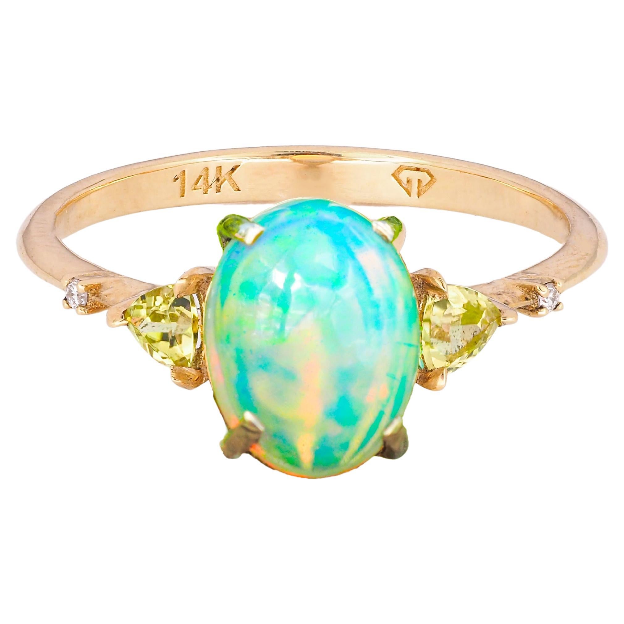 En vente :  Bague en or 14 carats avec opale, diamants et péridots