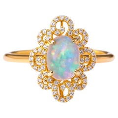 14k gold ring with oval opal cabochon