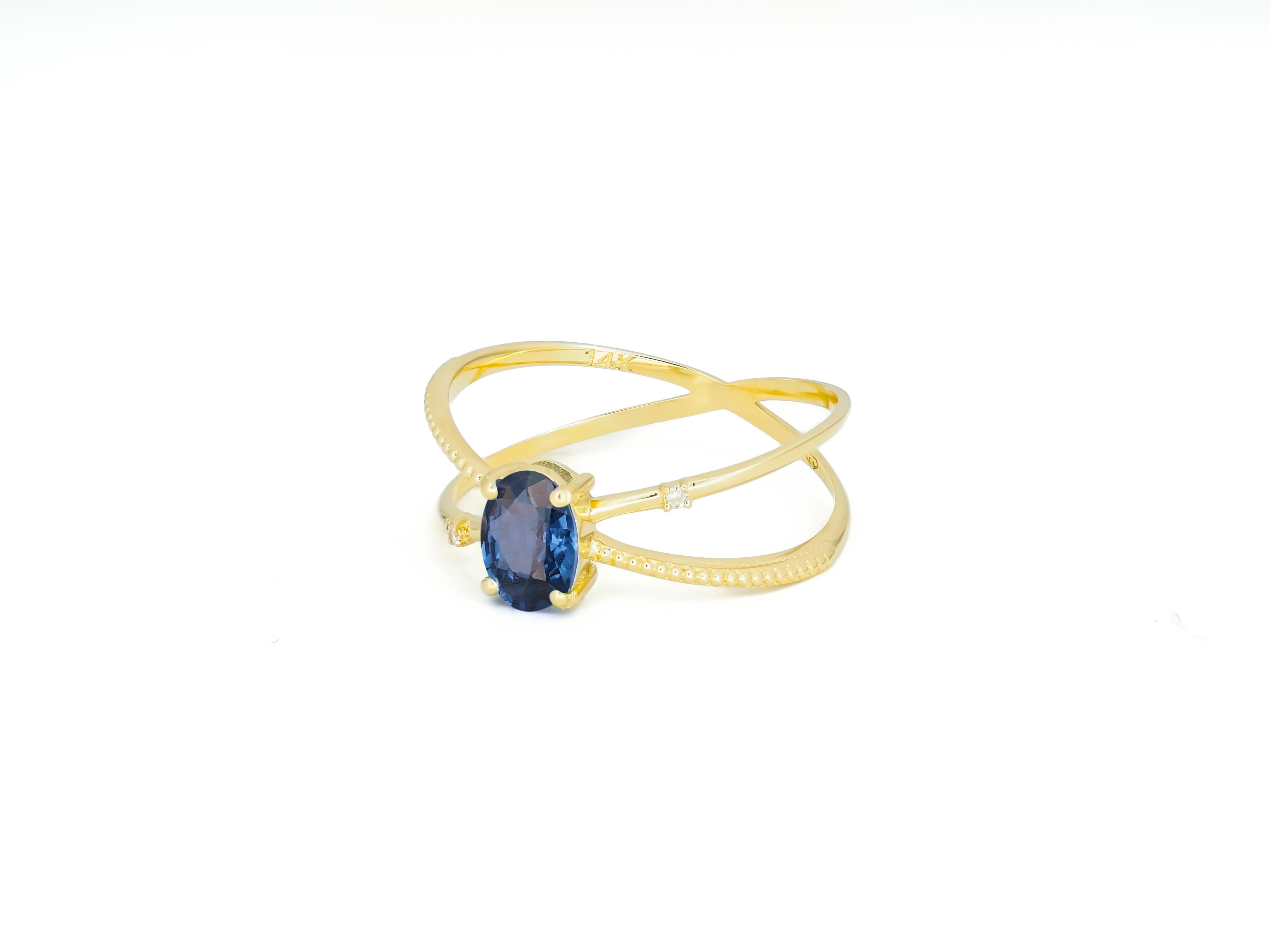 Ring aus 14 Karat Gold mit ovalem Saphir.  (Ovalschliff) im Angebot
