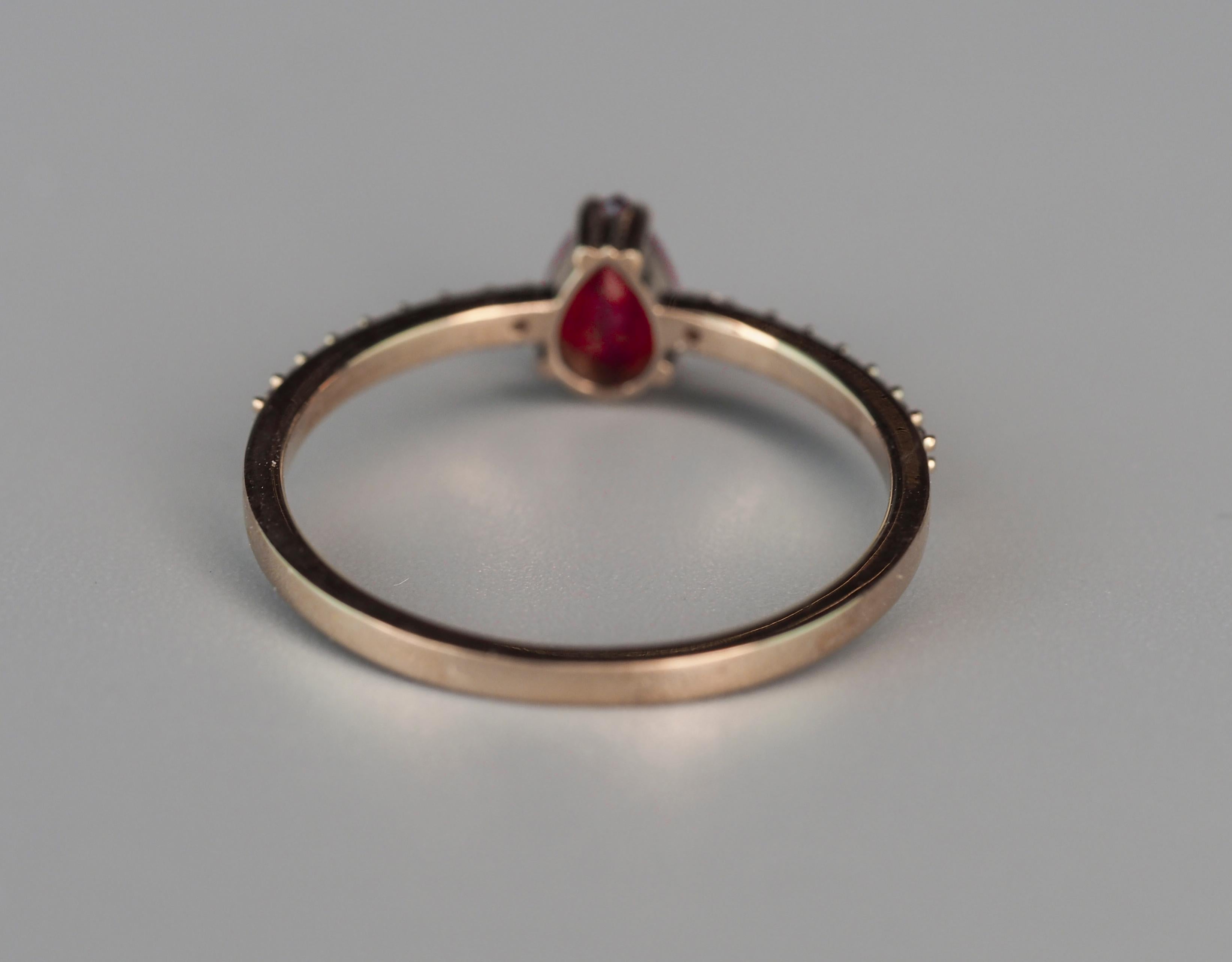 For Sale:  14 karat Gold Ring with Pear Ruby and Diamonds. Minimalist ruby ring 3