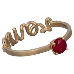 14 Karat Gold Ring mit rundem Rubin und Diamanten