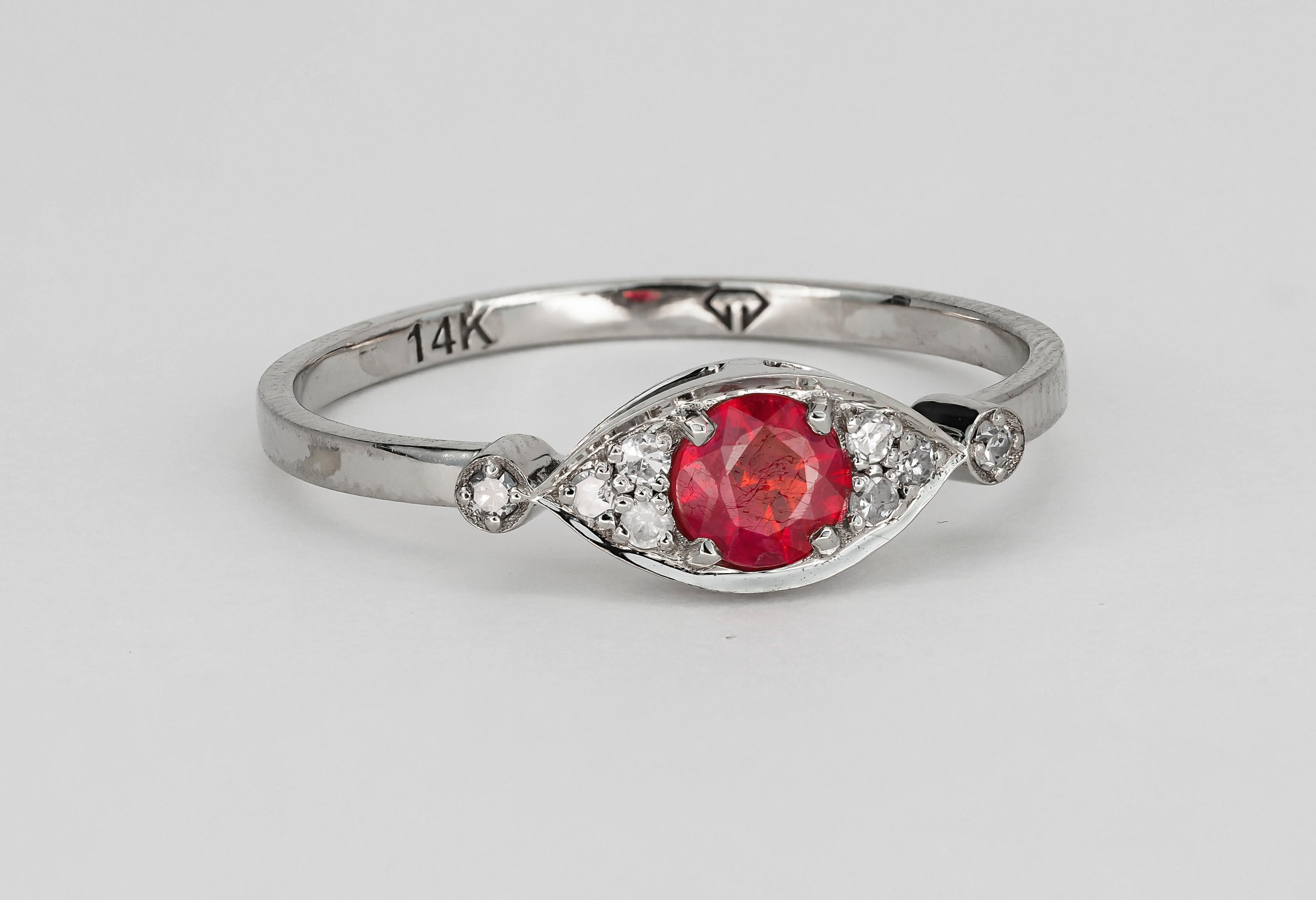 For Sale:  14 karat Gold Ring with Ruby and Diamonds.  