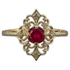 14 karat Gold Ring with Ruby and Diamonds. Vintage style ruby ring
