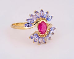 14k Gold Ring with Ruby and Tanzanites.