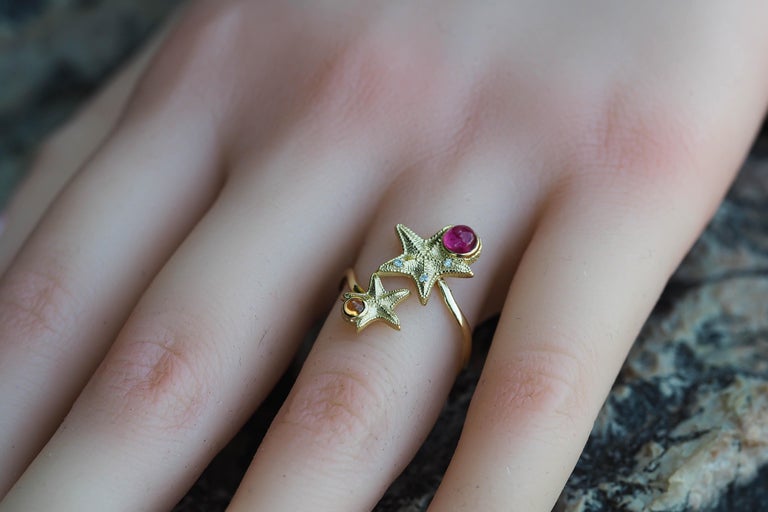 For Sale:   Ruby and Sapphire cabochon ring in 14 karat gold.  Star Fish Ring 9