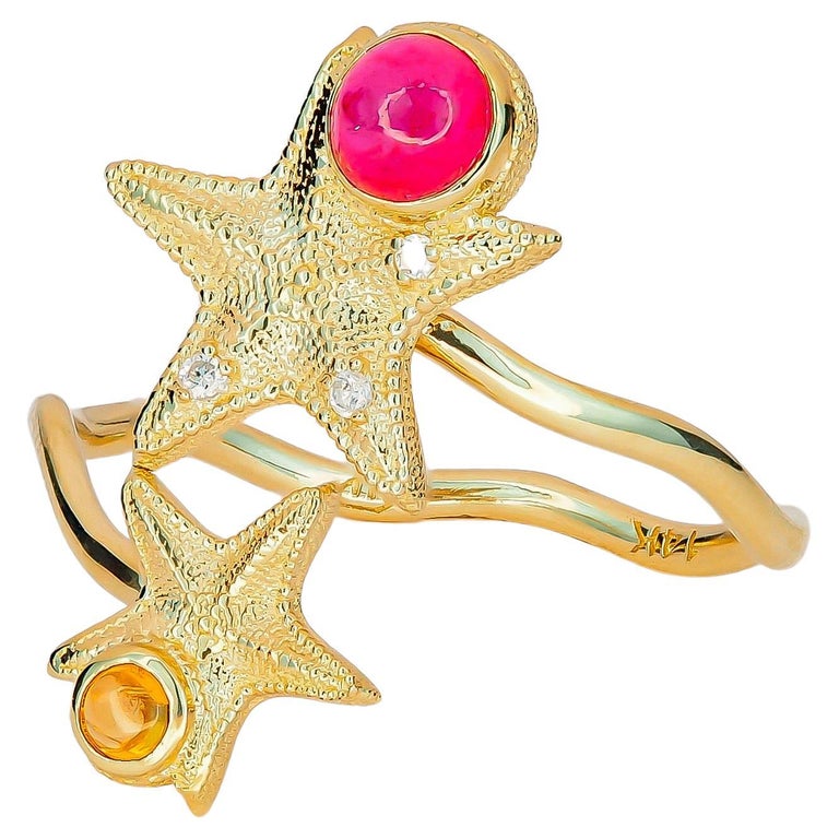 For Sale:   Ruby and Sapphire cabochon ring in 14 karat gold.  Star Fish Ring