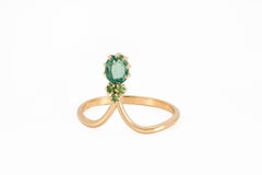 14 Karat Gold Ring with Sapphire and Tsavorites