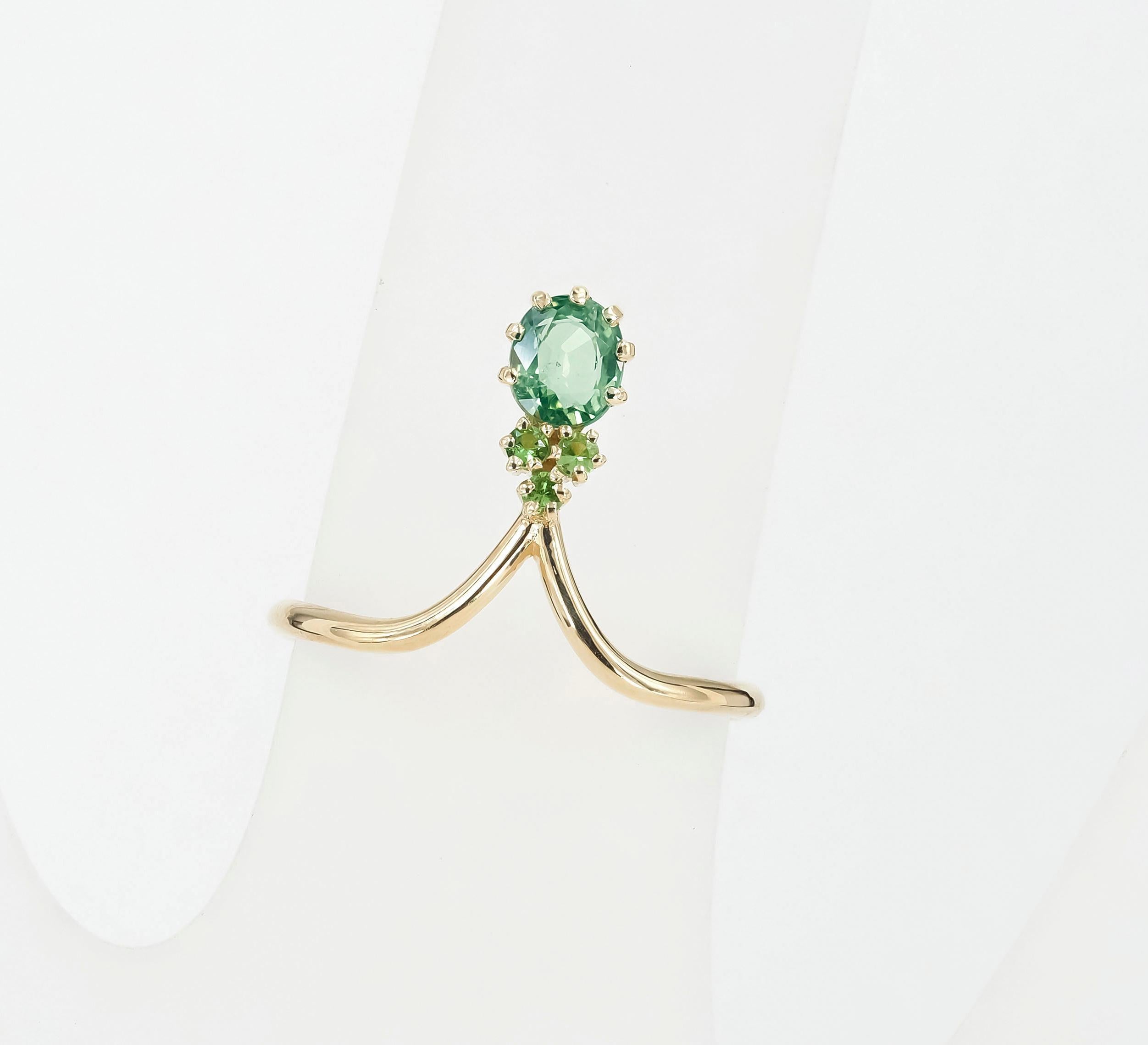 For Sale:  14 Karat Gold Ring with Sapphire and Tsavorites 7