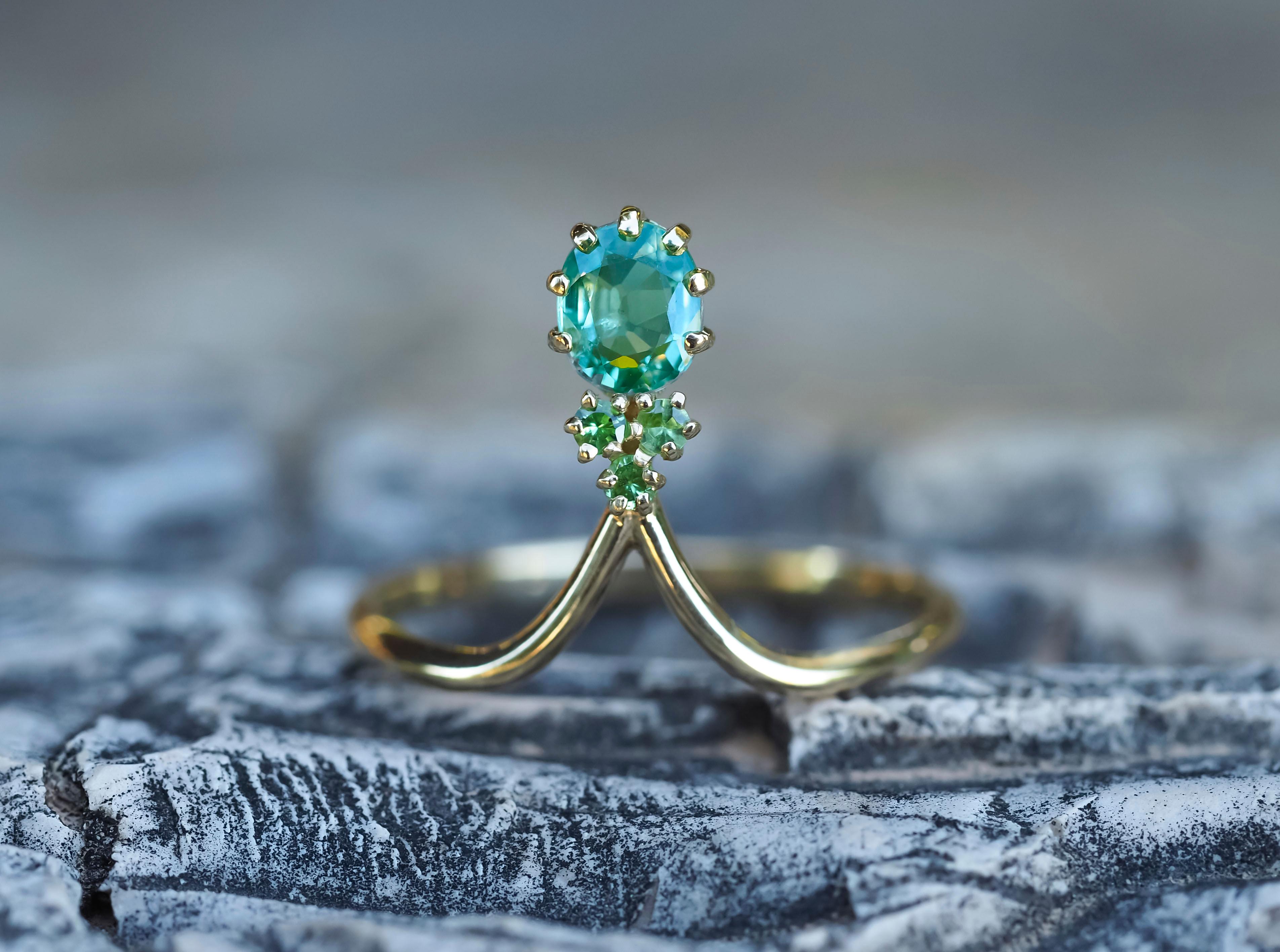 For Sale:  14 Karat Gold Ring with Sapphire and Tsavorites 8