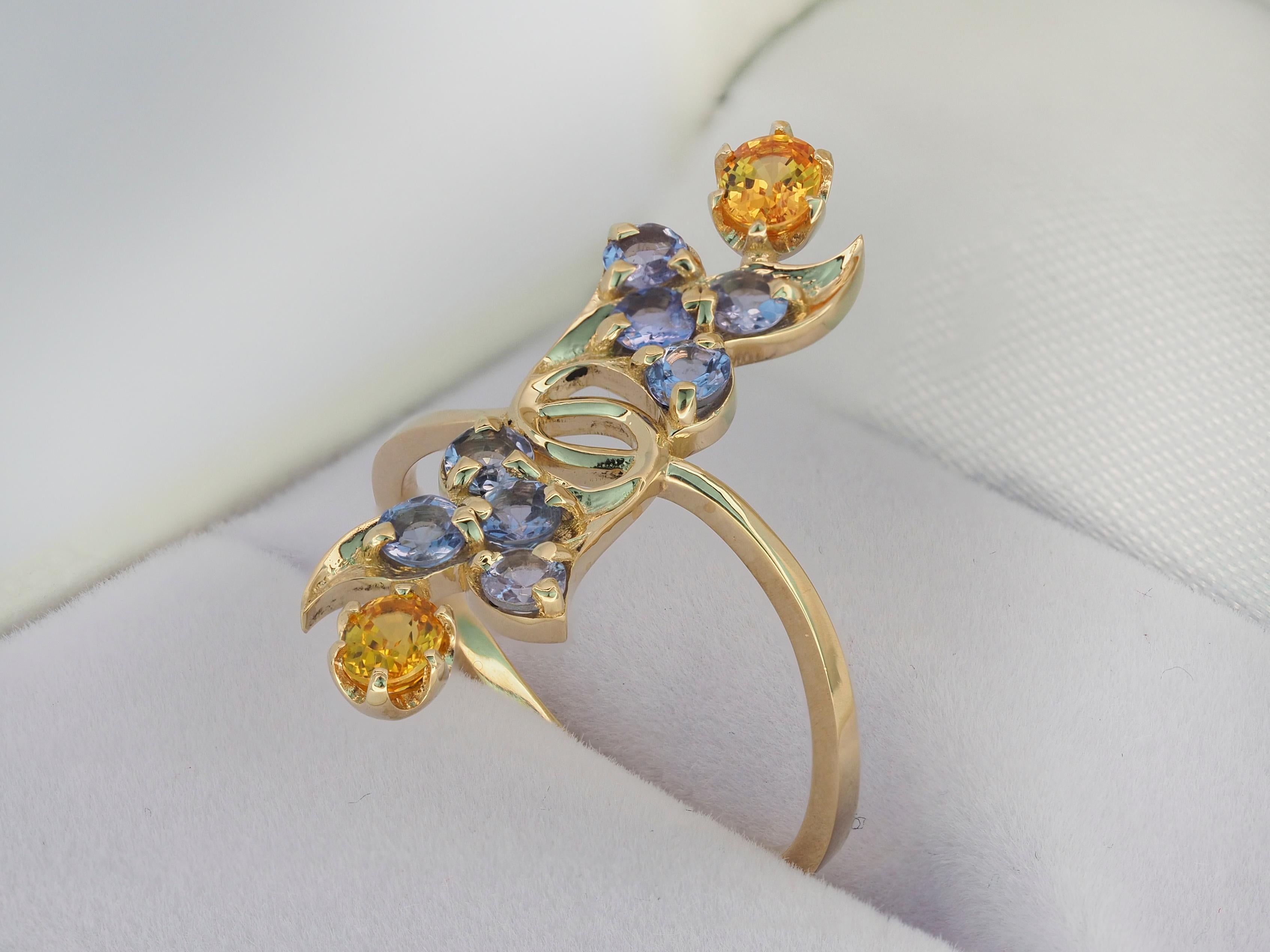 For Sale:  14 karat gold ring with genuine sapphires and tanzanites 6