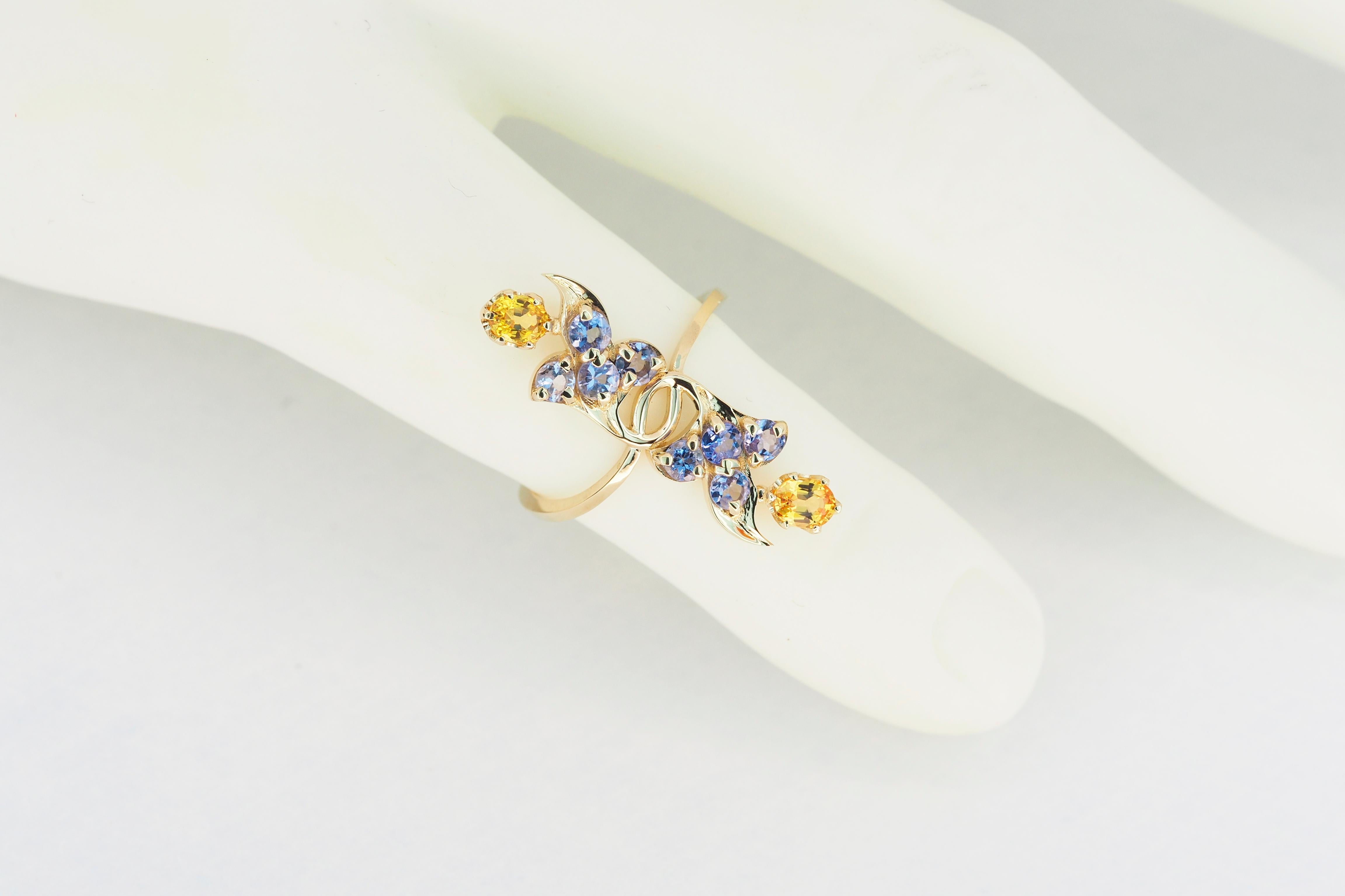 For Sale:  14 karat gold ring with genuine sapphires and tanzanites 7