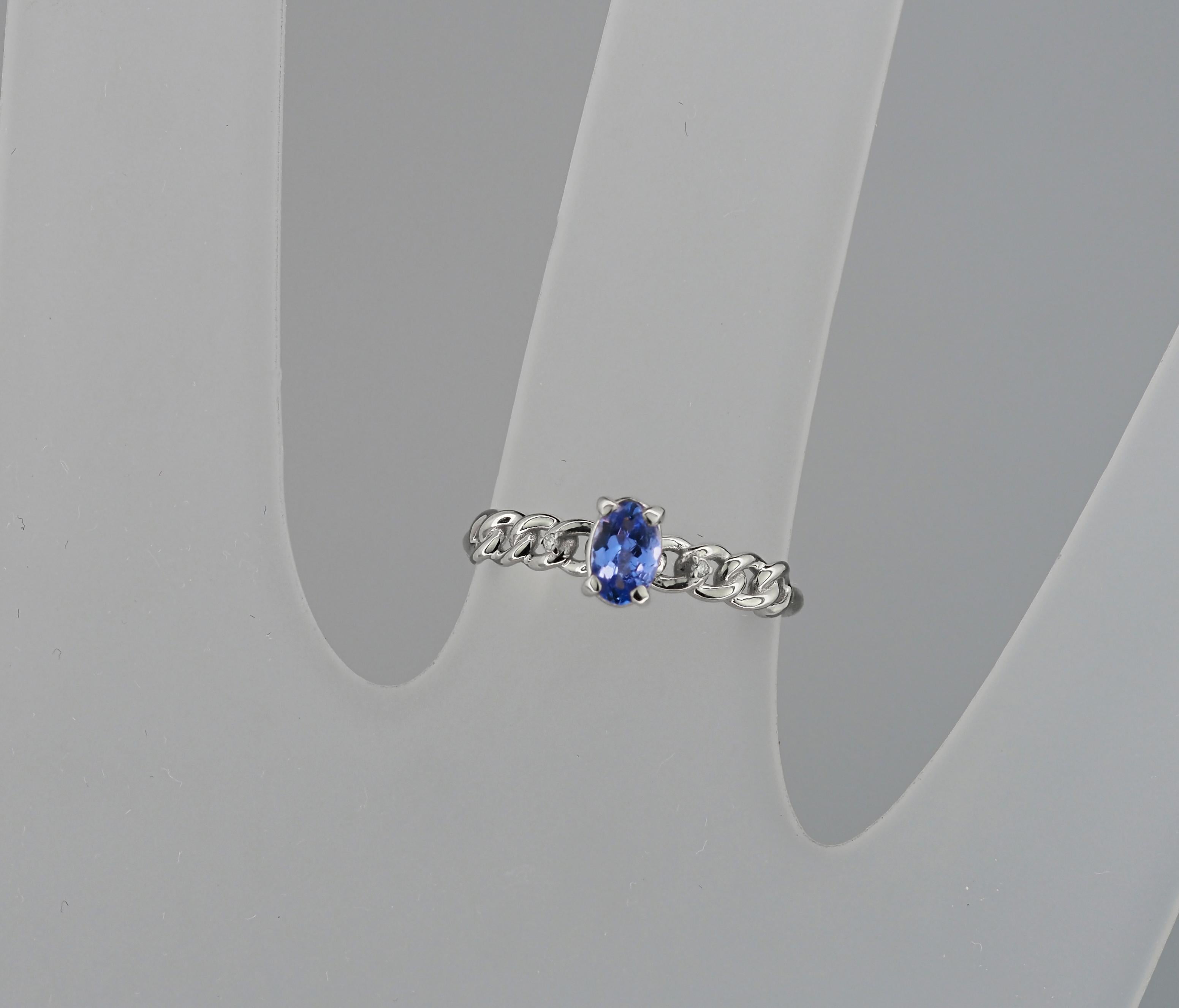 For Sale:  14k Gold Ring with Oval Tanzanite and Diamonds 9