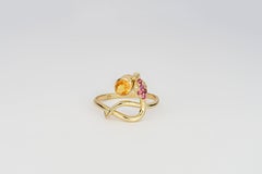 Snake ring with orange sapphire in 14k solid gold