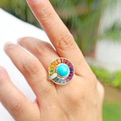Anillo giratorio de oro de 14 quilates con turquesa en cabujón, piedras preciosas multicolores y diamantes