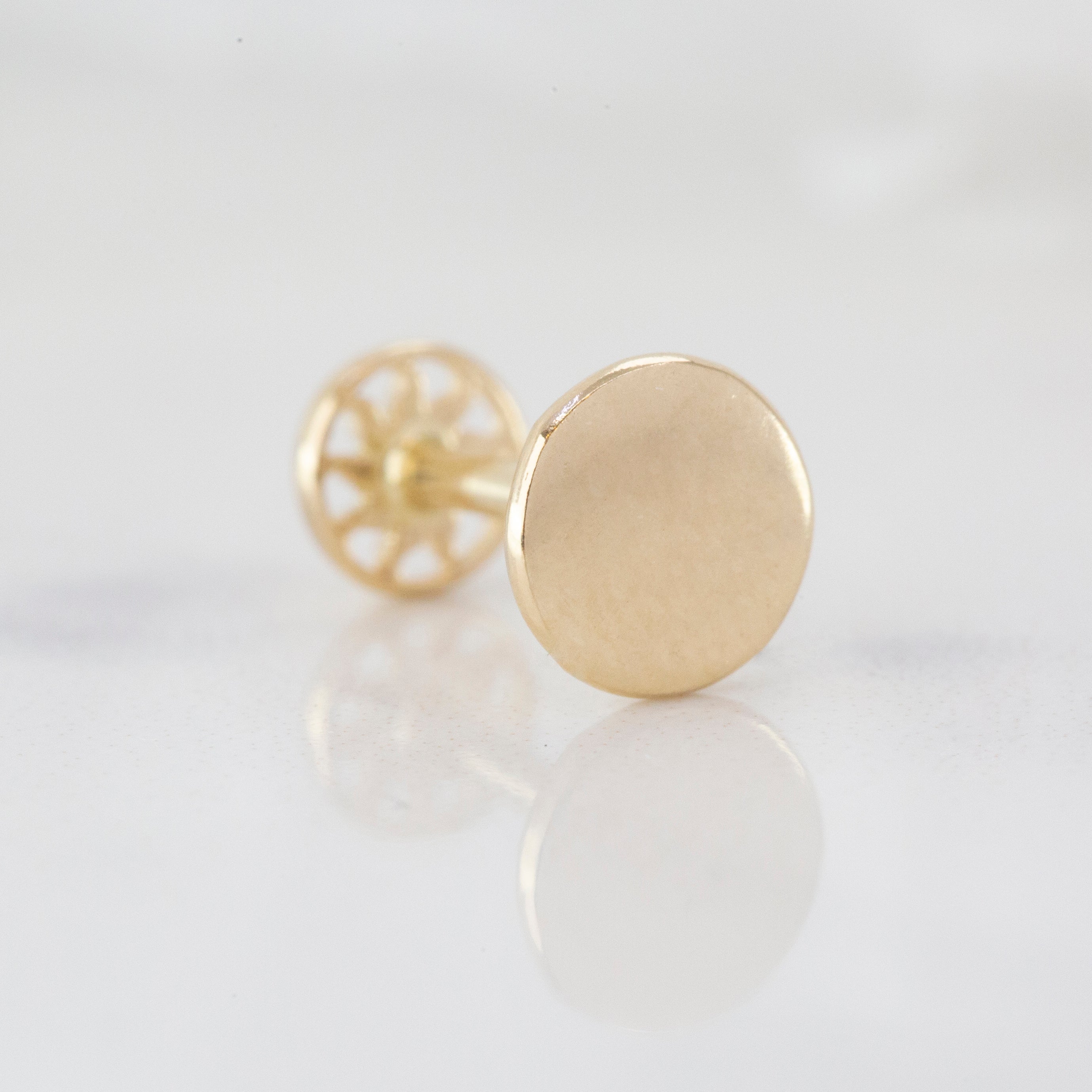14K Gold Round and Circle Piercing, Gold Stud Earring

You can use the piercing as an earring too! Also this piercing is suitable for tragus, nose, helix, lobe, flat, medusa, monreo, labret and stud.

This piercing was made with quality materials
