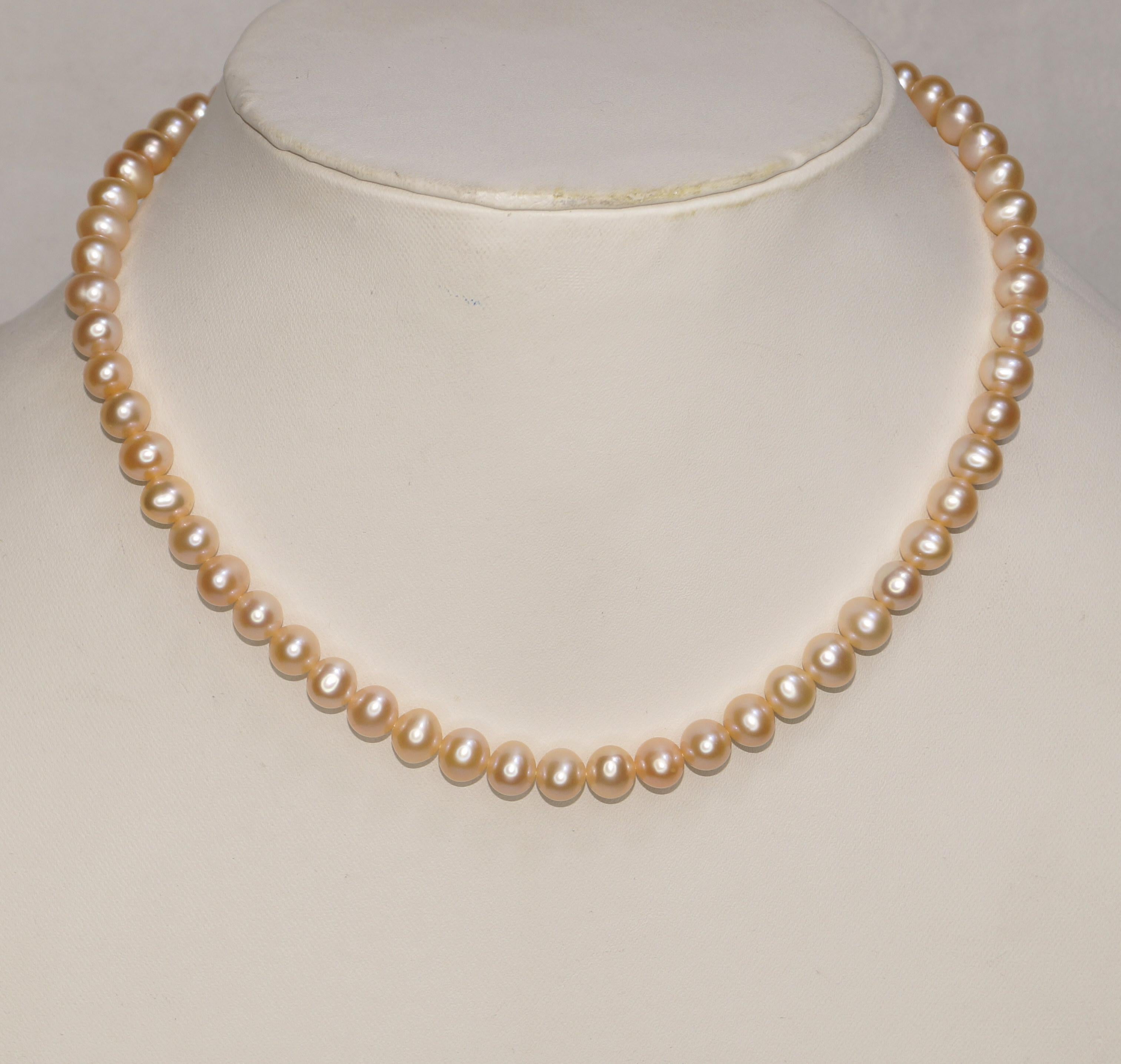 Details:
: 14k Yellow Gold Lock Freshwater pearl beads Necklace.

: Item no- KM32/1001/9837

:Pearl Size: 8mm (Approx.)

:Necklace length: 16