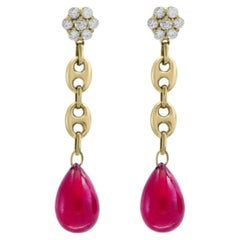 Boucles d'oreilles en or jaune 14 carats, avec un rubis naturel de 45 carats et un diamant de 1,5 carat