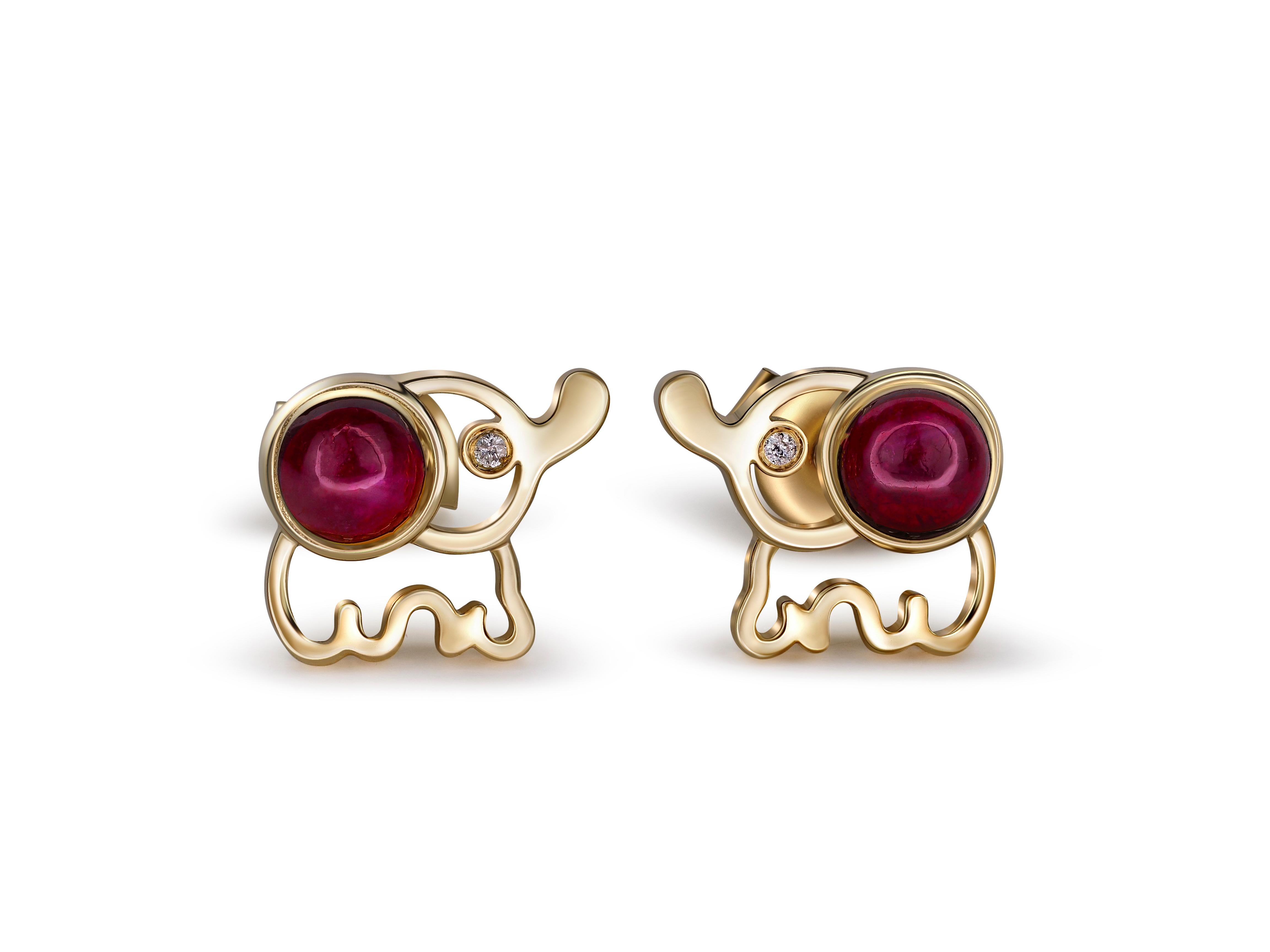 14k Gold Ruby Earrings Studs. 
Elephant earrings studs. Animal earrings. Cabochon ruby studs. Safari gold Jewelry. July birthstone earrings.

Metal type: 14kt solid gold
Weight: 2.2 g.
Size: 11 x 8 mm.

Set with natural ruby - 2 pieces, color -