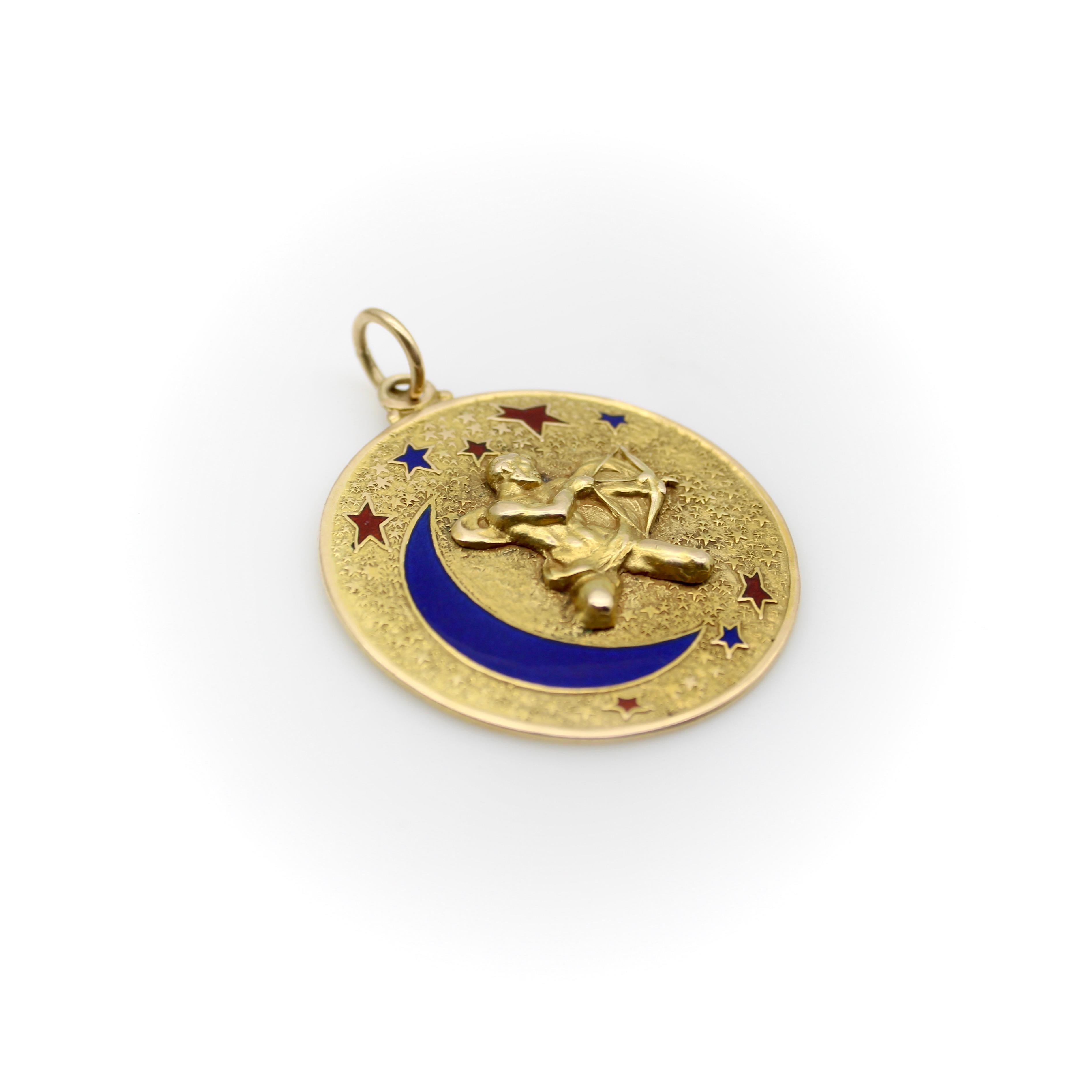 This large 14k gold medallion pendant is beautifully sculpted with the image of Sagittarius the archer amid a background of stars. In the image, Sagittarius is muscular and godlike; he pulls back the bow and arrow with flexed biceps. The buildup of